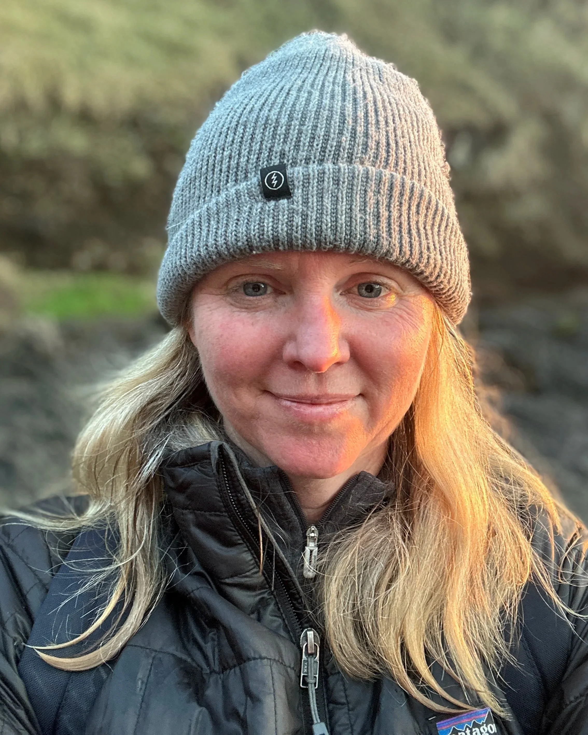 Profile photo of me with a beanie on.