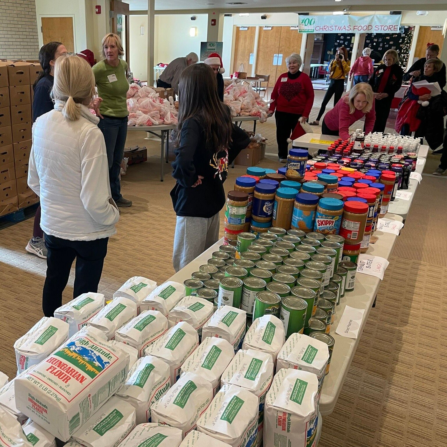 Behold the work of the Hunger Task Force @wpcdenver ! For 35 years, this incredible team has been &quot;adopting&quot; families during the holidays and providing generous bundles of staples like PB&amp;J, sugar, flour, soups, fresh produce, and warm 