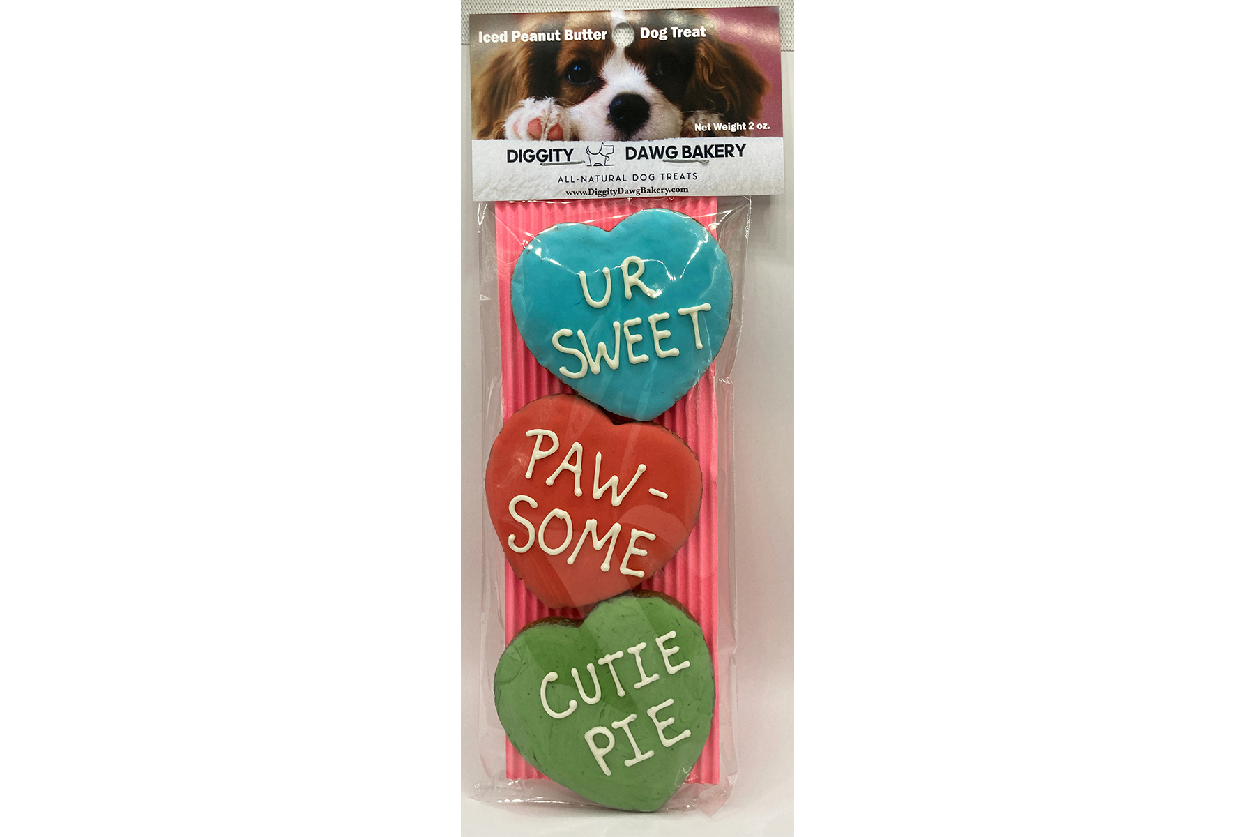 Image of conversation heart treats with Valentine's Day themed phrases like "Be Mine" and "Fur Ever" in a variety of colors. 3 per package.