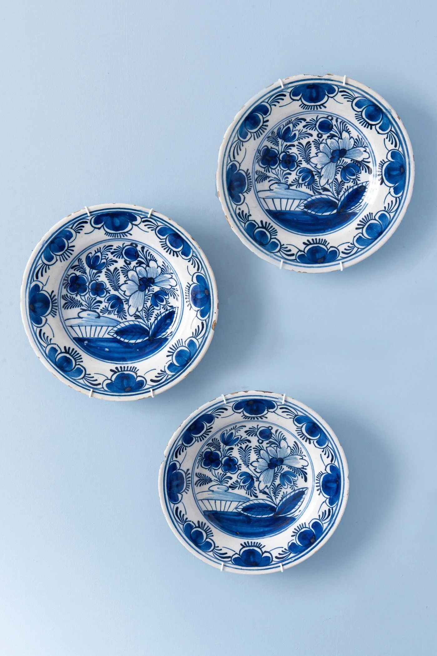 Dutch Delft, Set of Three Blue & White Floral Plates, 18th century