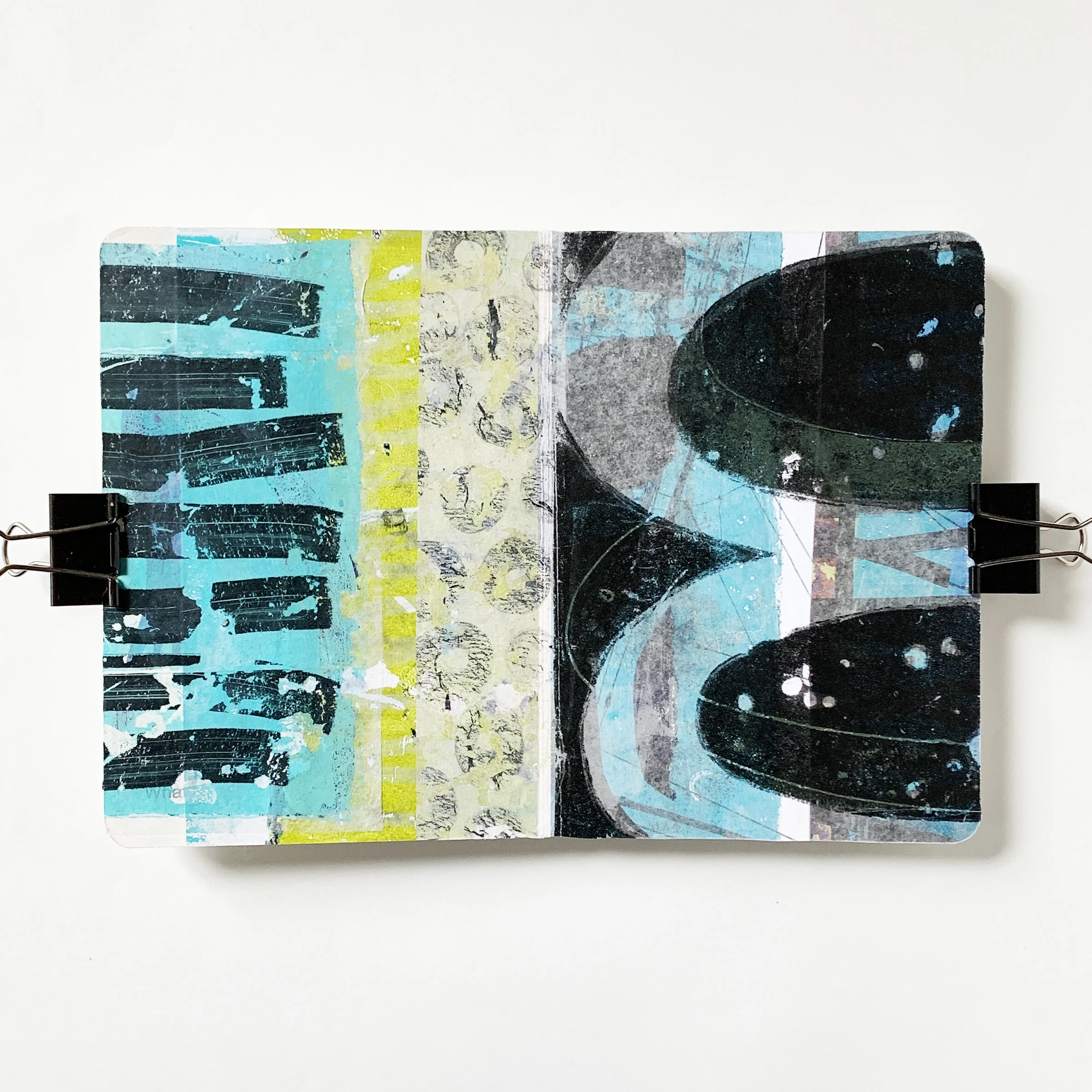 Workbook spread, 10x7 inches / 254x177 mm, Collaged monoprinted papers on child’s board book.