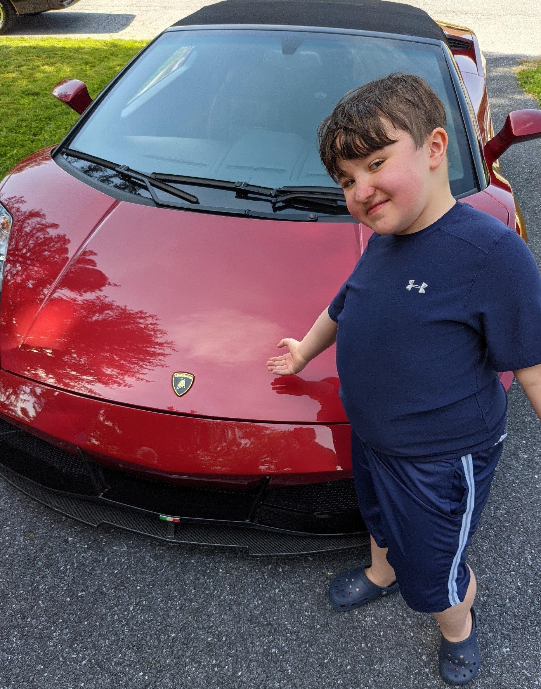Drew flexing with his dream car!