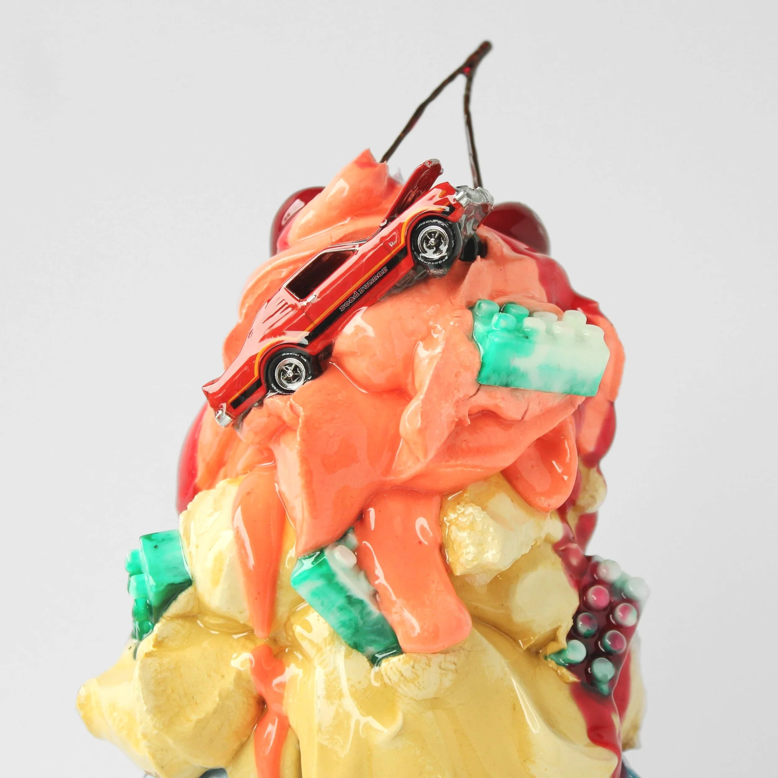 Road+Runner+in+Spitfire+Orange_+15inx6x6in_+resin%2C+pigmented+cement_%241500-9.jpg