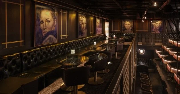 I am behind on posting about a series of James Bond femme fetale paintings for Michel Arnette's most recent dining achievement, The Associate.  If you have not had the privilege of experiencing one of Michel's restaurants in Atlanta you are sorely mi