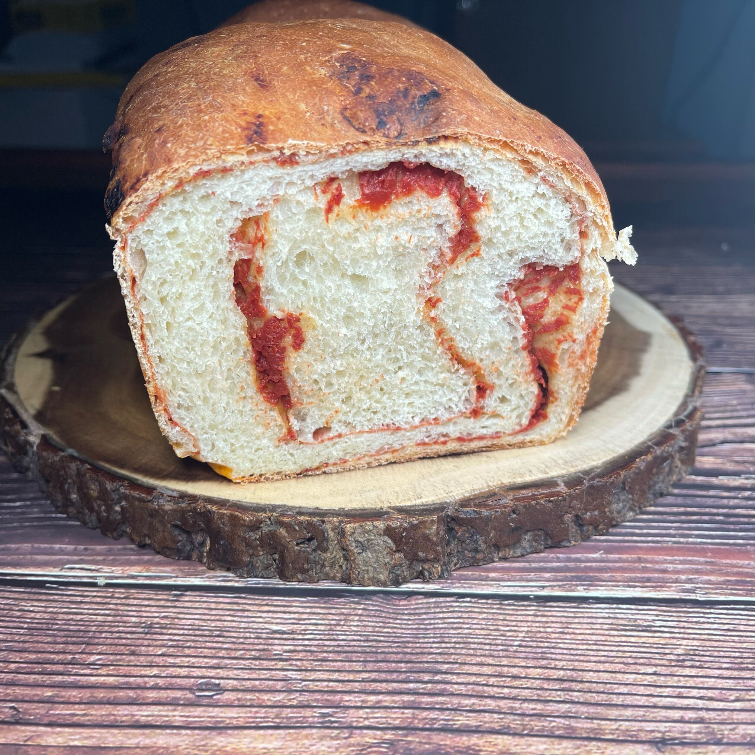 Crumb Shot of first slice of Tomato Swirl Bread
