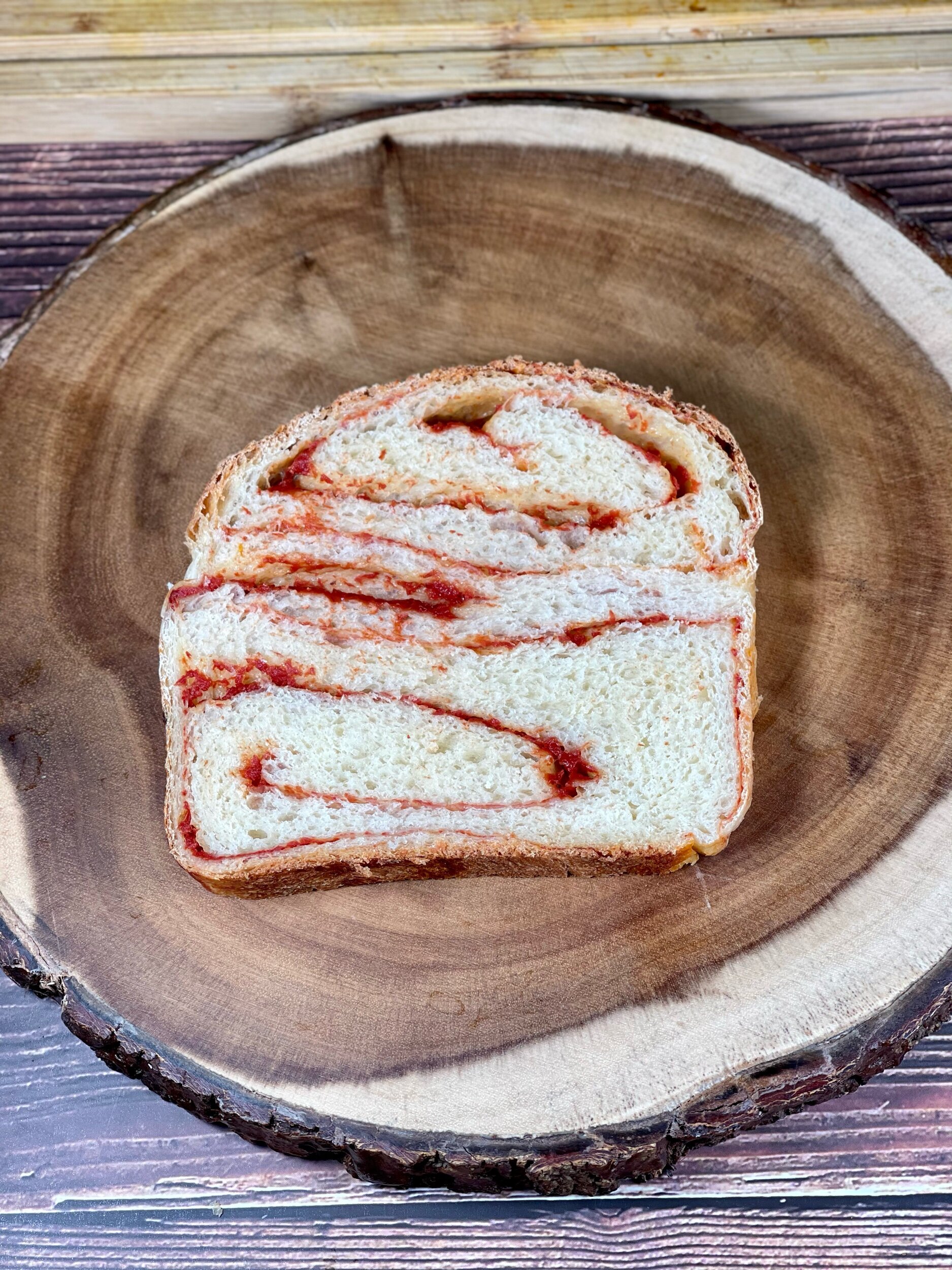 Slice of Tomato Swirl bread from middle of loaf