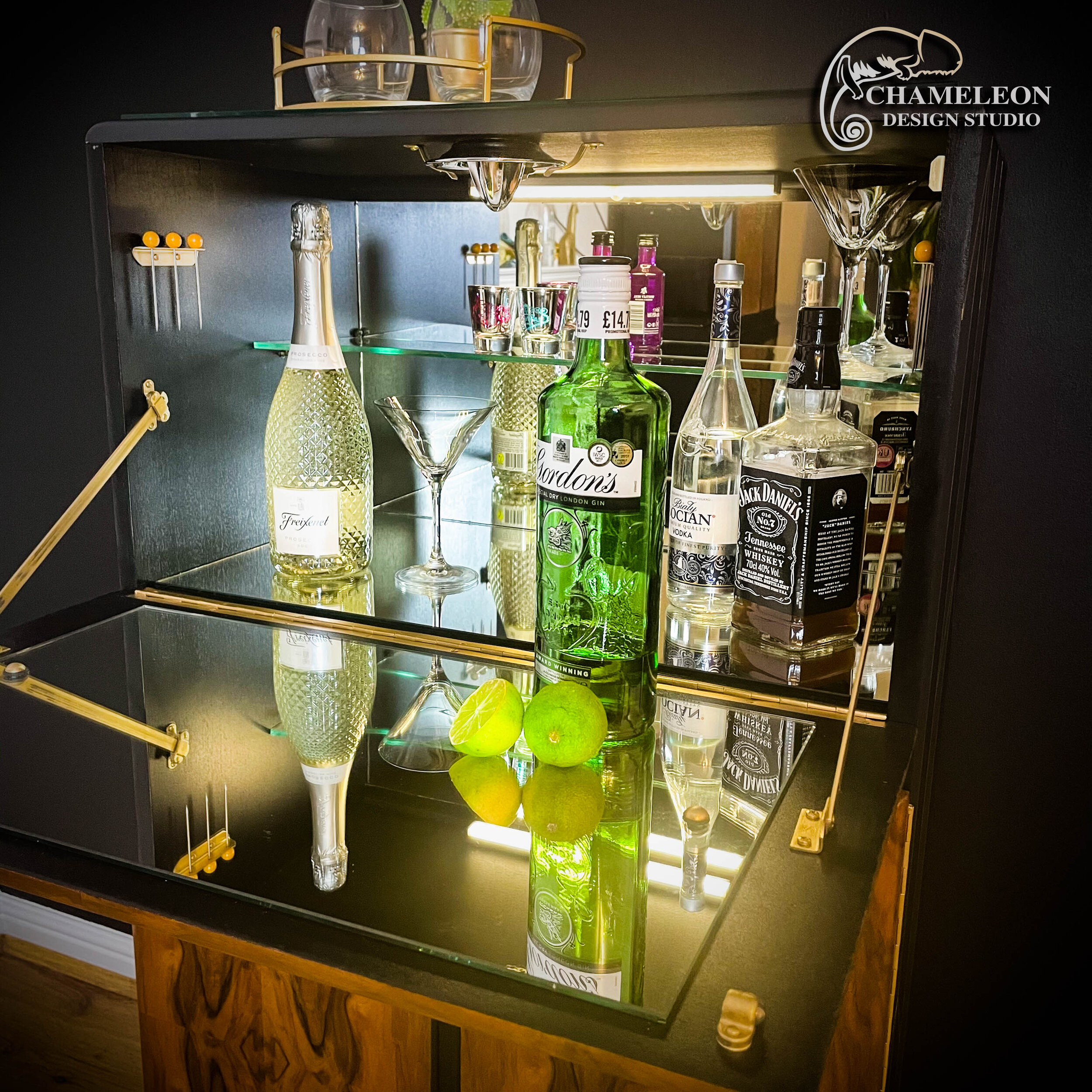 Drinks Cabinet with open bar section. Glass mirrored inside the bar