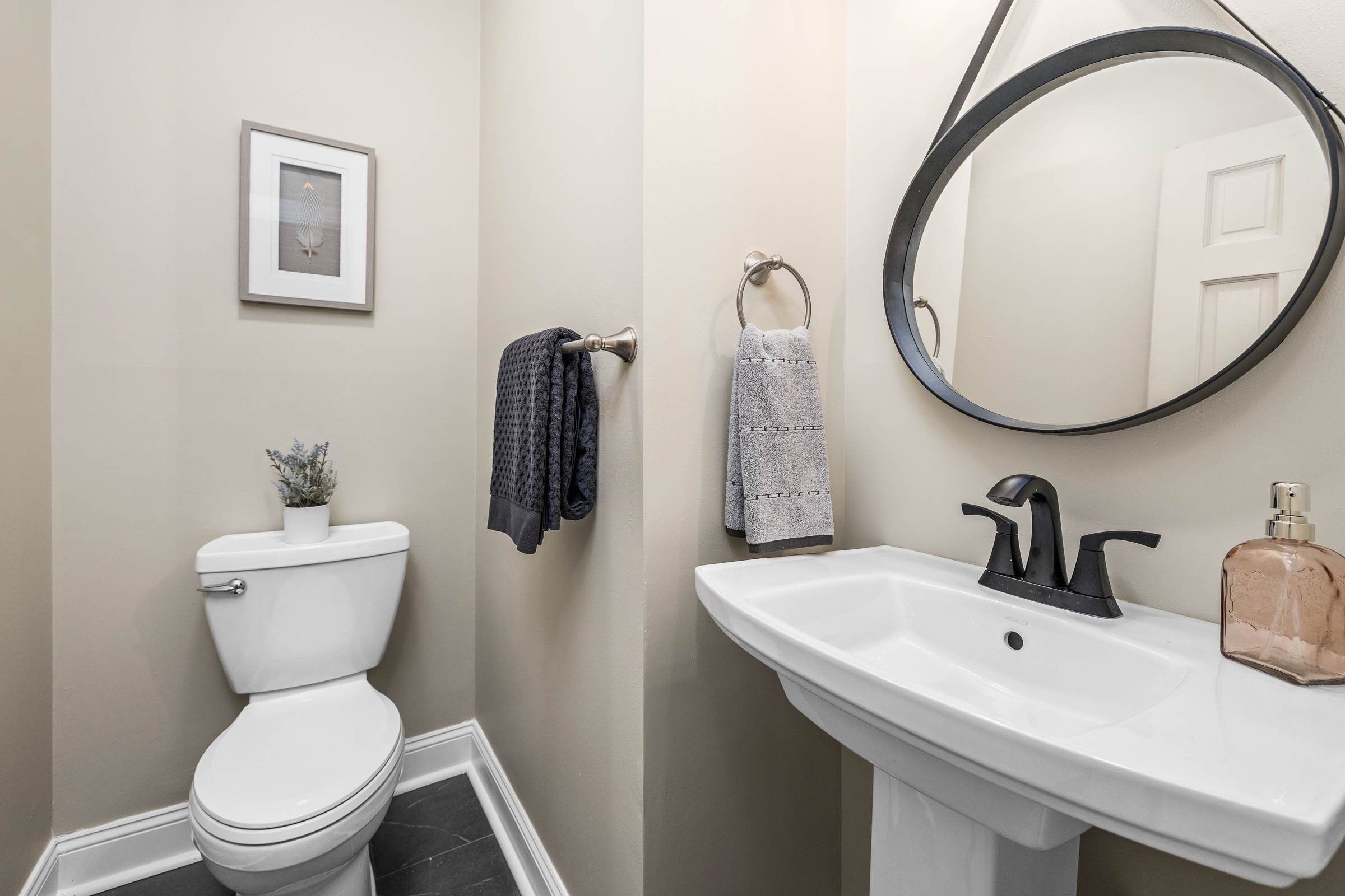 A Quick Bathroom Update with New Paint, Floors, Fixtures, Sink, Toilet and a Fun New Mirror Made This Half Bath Pop! Crozet, Virginia