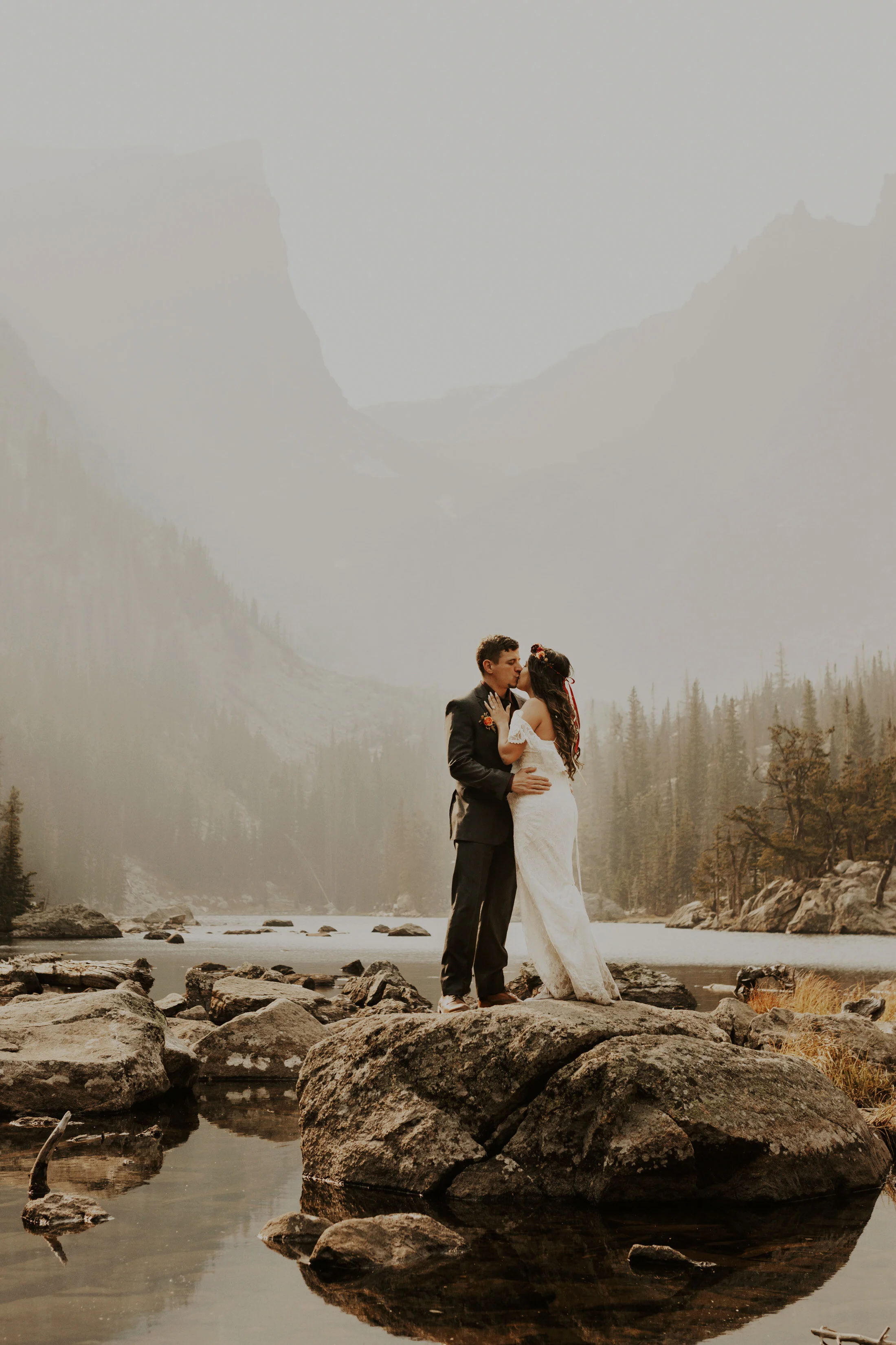  This beautiful couple eloped in the gorgeous mountains of Colorado with Dawn Louise Photography. Budget friendly weddings intimate and small cheaper wedding bride and groom mountain elopement escape destination weddings elope adventure lifestyle wed