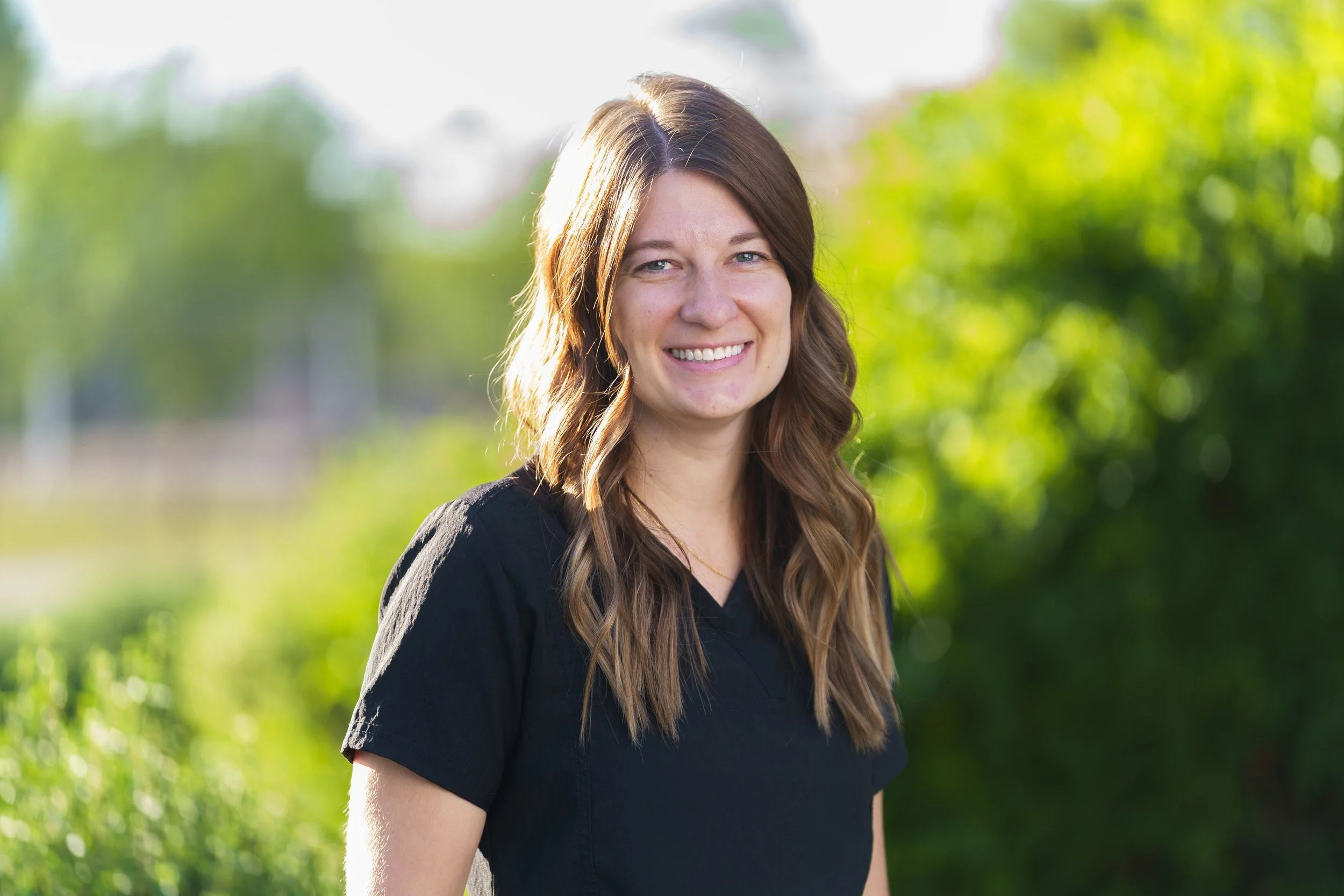 Outdoor professional headshot of a dental team member in Gilbert, Arizona