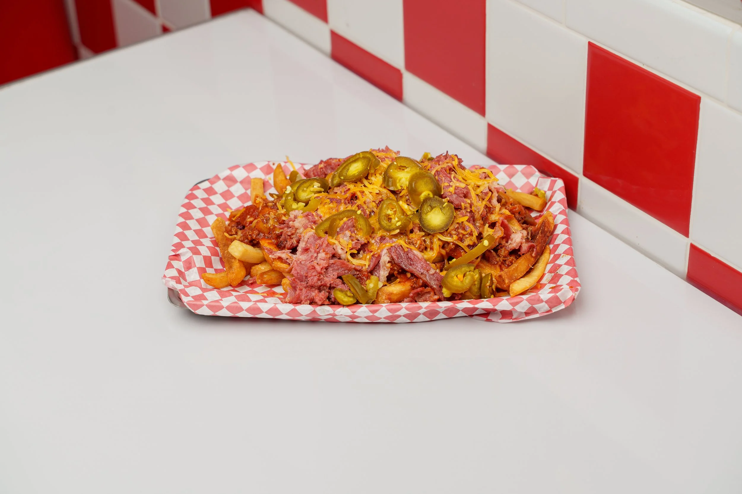 Loaded fries with meat cheese and jalapenos photographed at Lenny's Burger in Phoenix