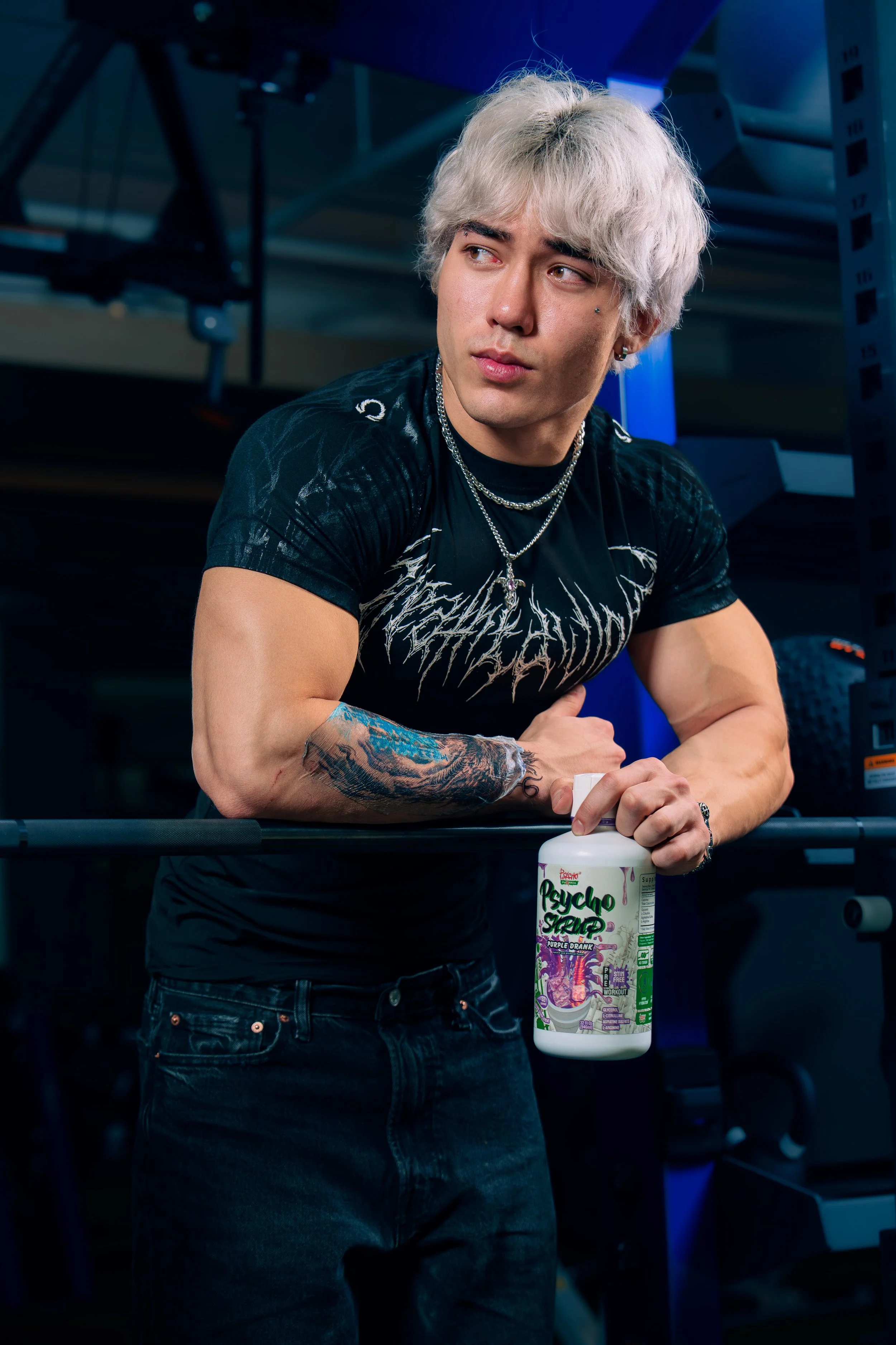 Male athlete posing with a fitness supplement during a commercial photography session in Phoenix Arizona