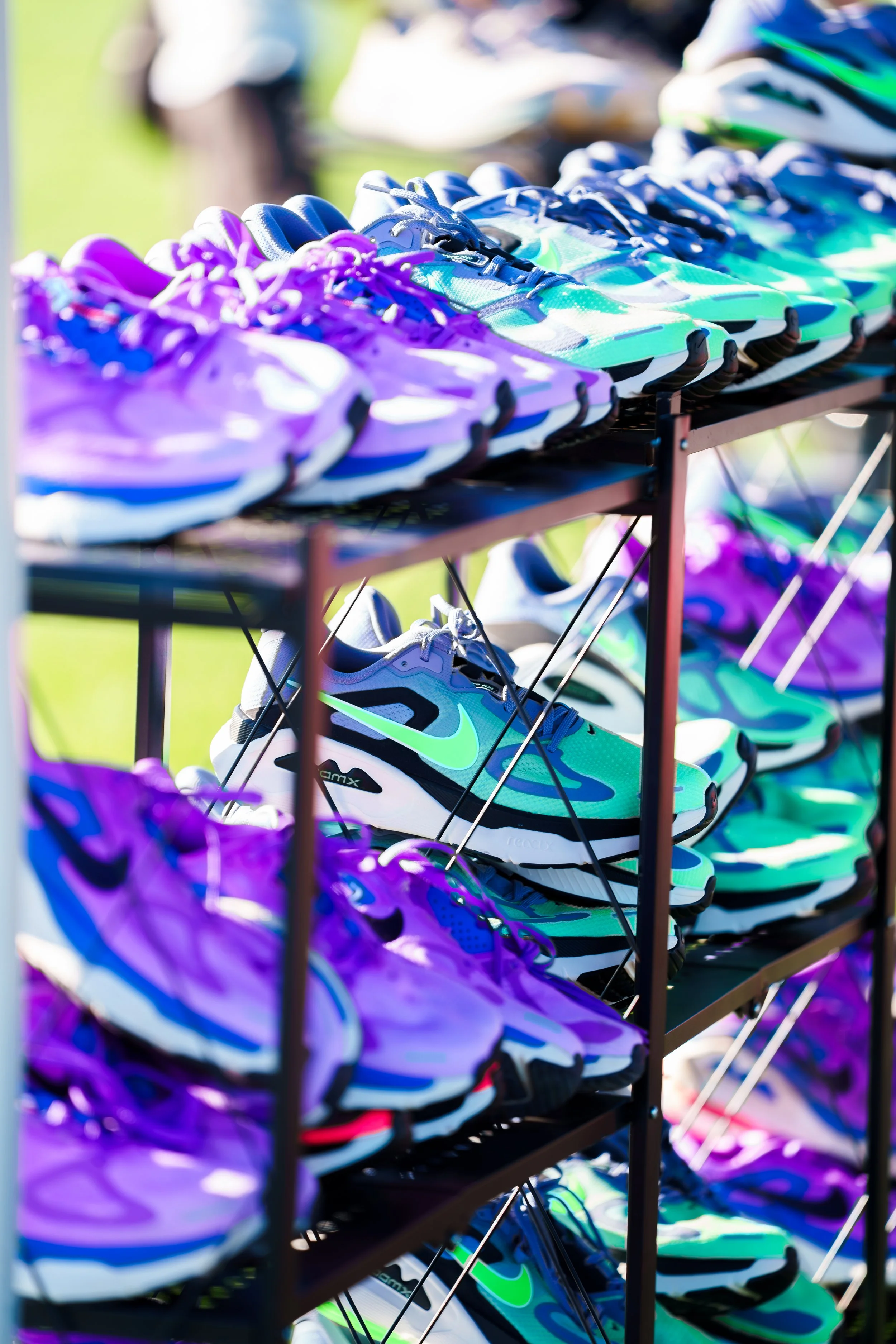 Colorful Nike running shoes displayed during the Project PR running event in Phoenix