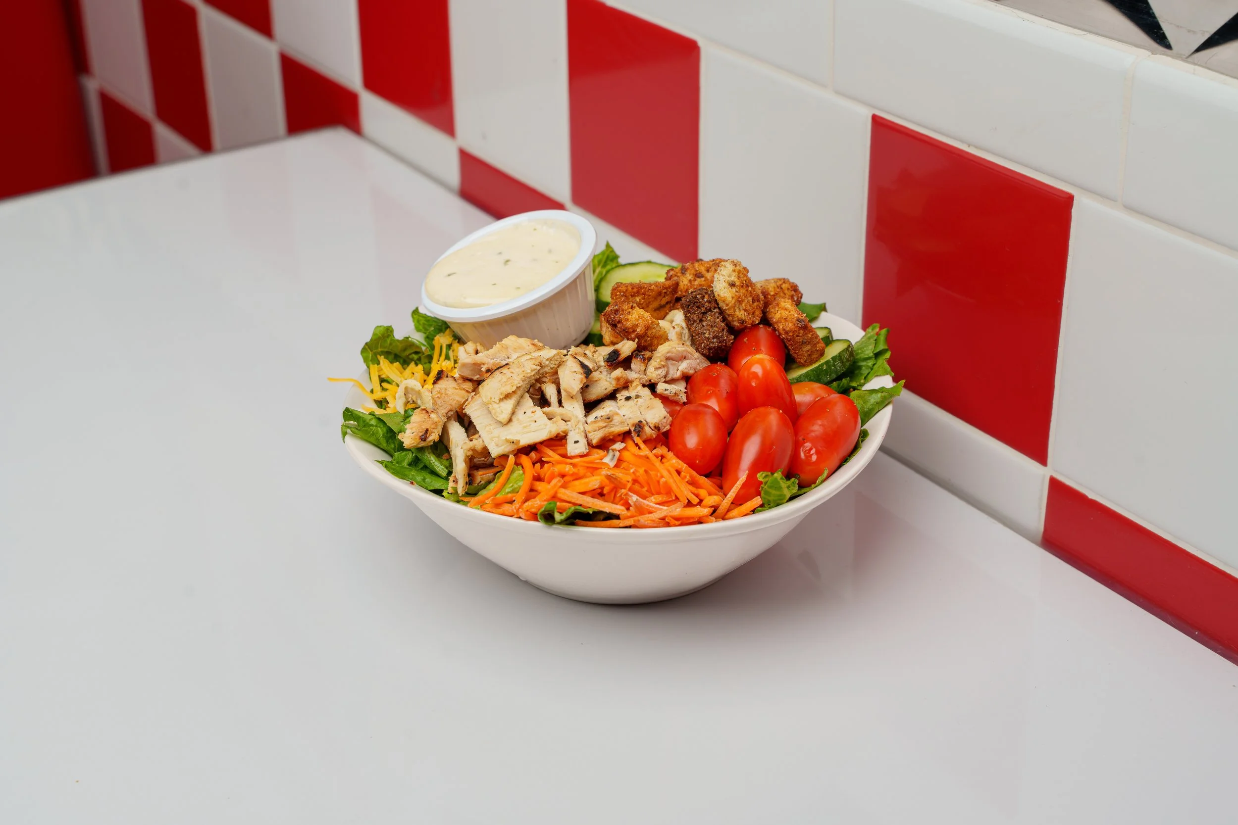 Grilled chicken salad photographed for a Phoenix restaurant marketing project