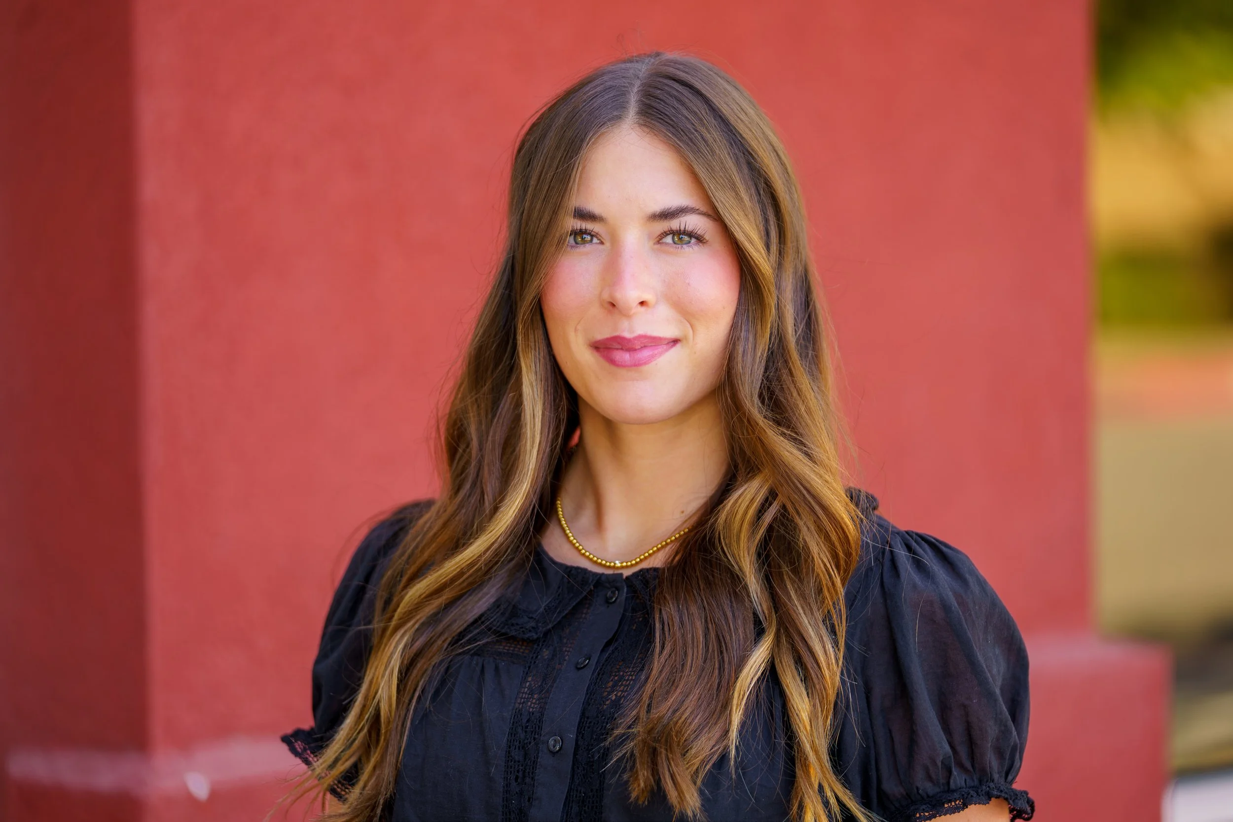 Professional portrait of a dental practice employee photographed outdoors in Gilbert