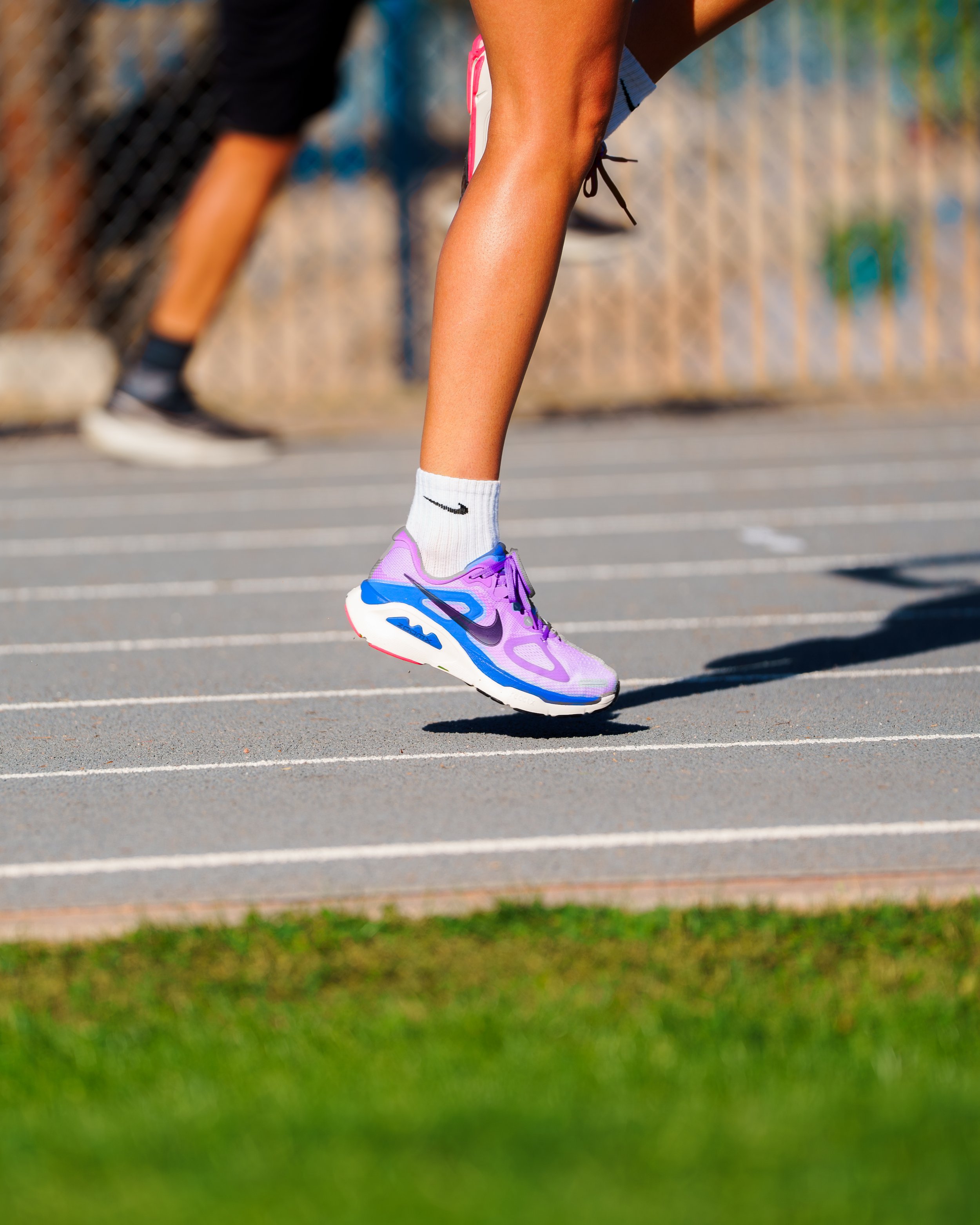 Close-up of a Nike running shoe in motion on the track during Project PR