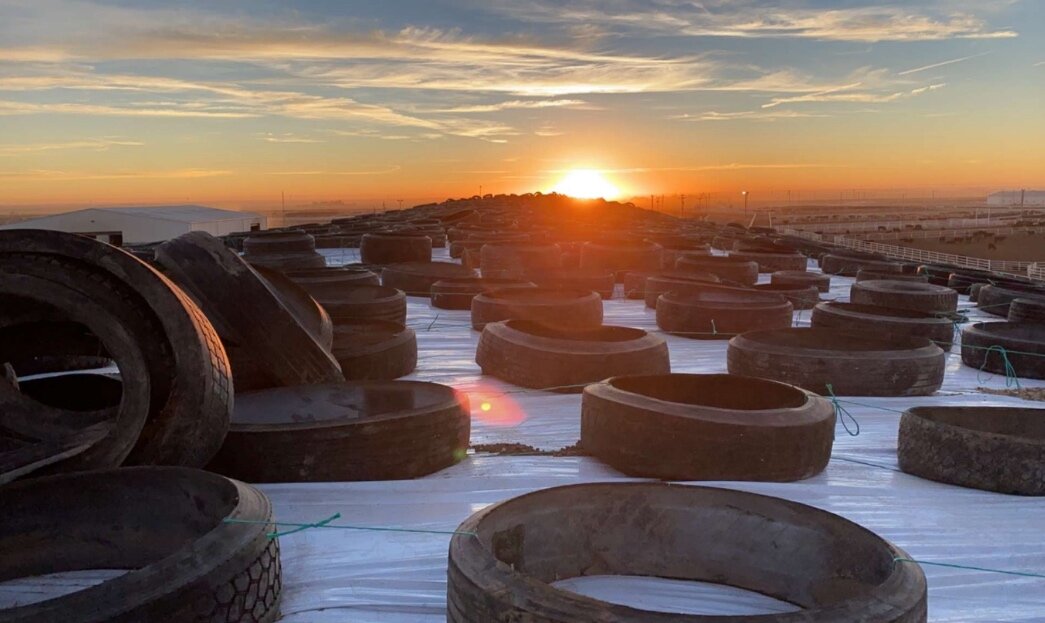 High+Caliber+Ag+Services+In+Action+Covering+Silage2.jpg