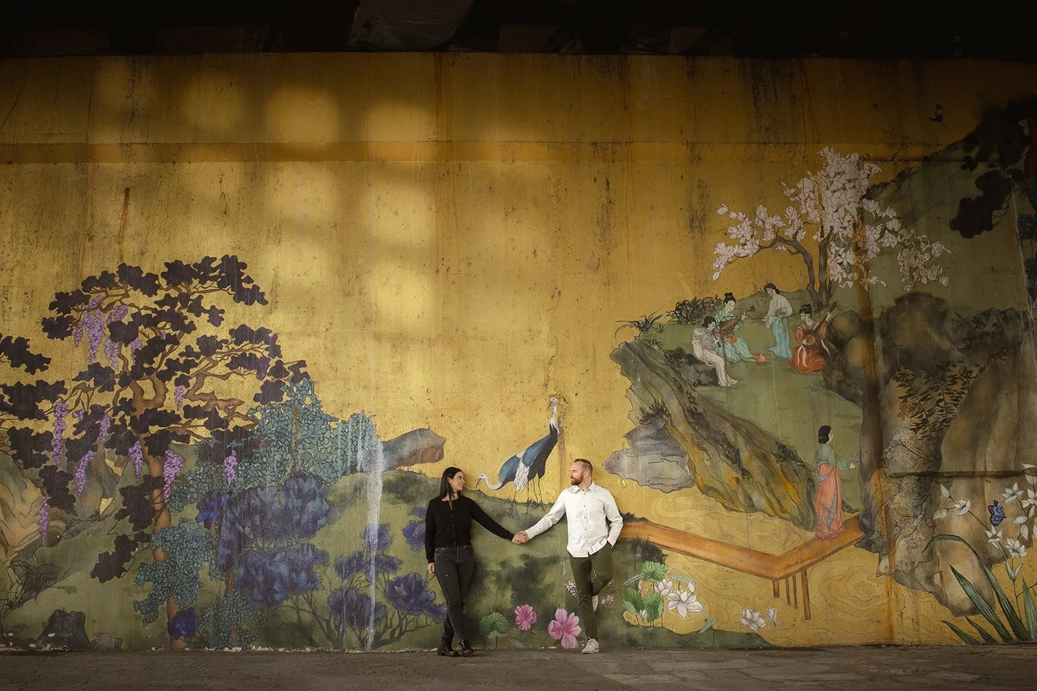Couple sharing intimate moment at Ping Tom Park pavilion during Chicago engagement session