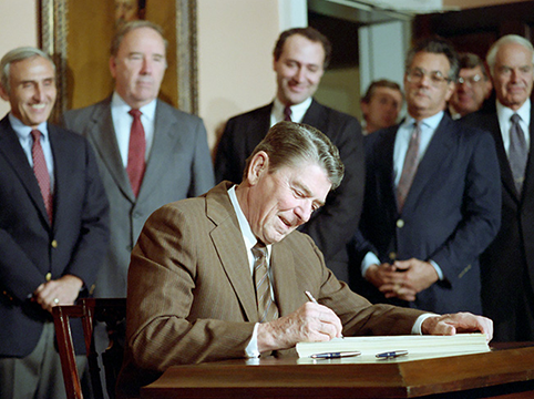 Ronald Reagan signing the 1986 IRCA law