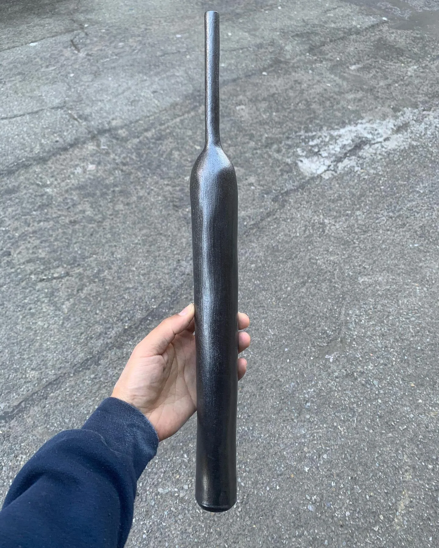 The finish on the black bottles is nice at cone ten but the clay warps beyond belief.  Going to have to stick to cone six!