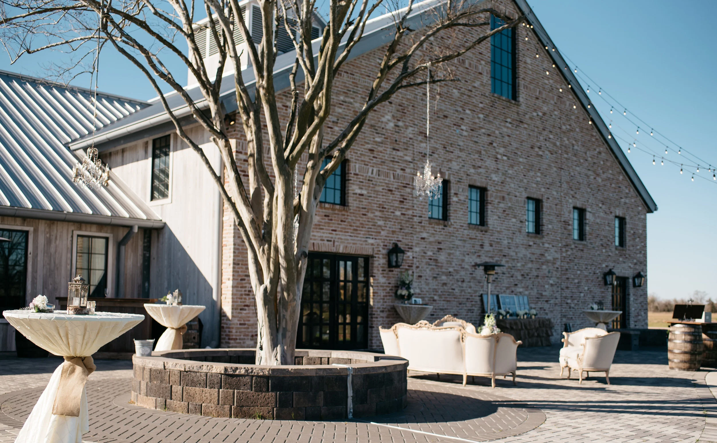 300-Tim+&+Lauren-wedding+1_18+Patio+full+w_+bar+highs_settee_chandeliers-D7S_2109.jpg