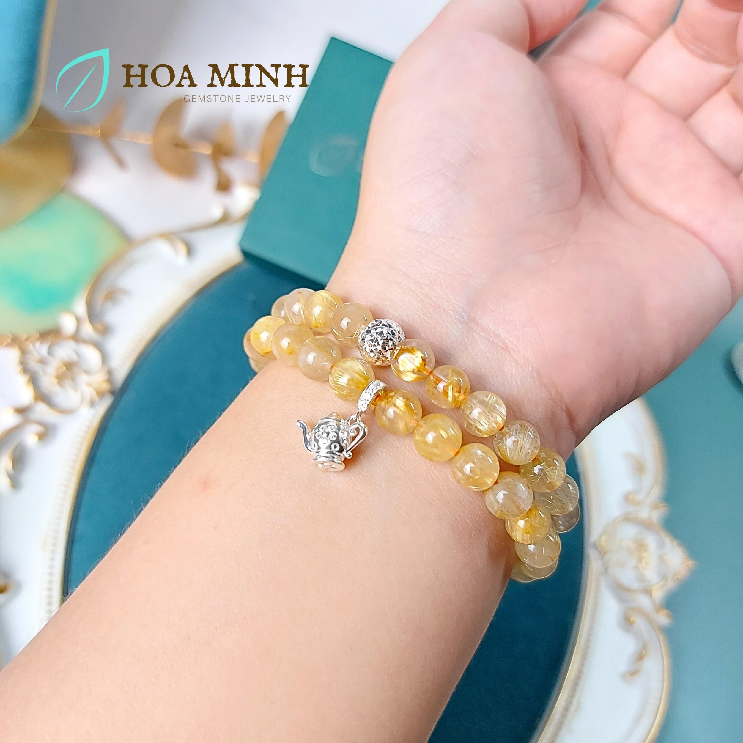 10-vong-tay-da-thach-anh-toc-vang-tu-nhien-vip-size-7-8-li-quan-2-vong-phoi-charm-bi-bac-cat-giac-charm-am-tra-hoa-hoa-minh-gem.jpg