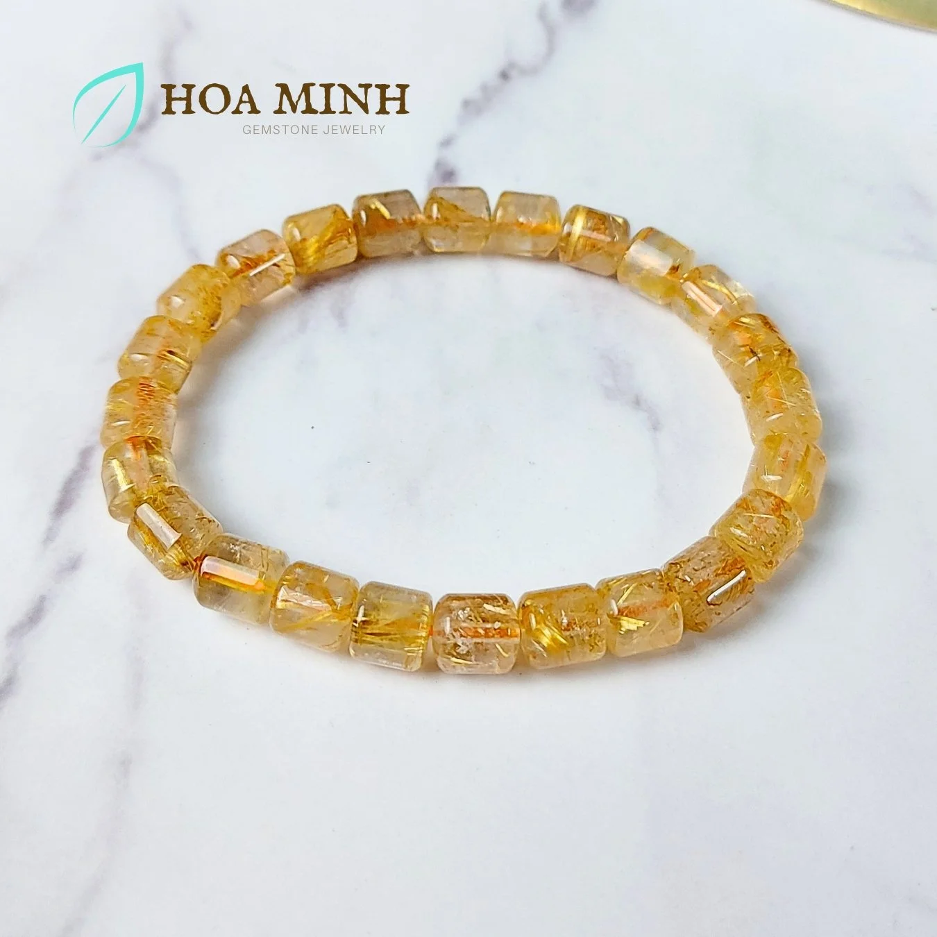 12-vong-tay-da-thach-anh-toc-vang-tu-nhien-vvip-kieu-lu-thong-size-7-5x8-li-phong-cach-dang-cap-sang-trong-hoa-minh-gem.jpg