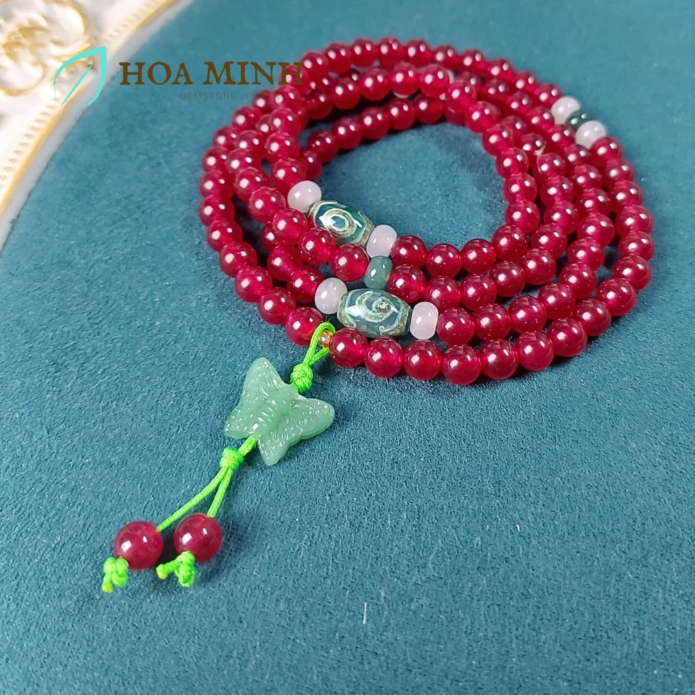 7-vong-chuoi-108-hat-da-ma-nao-do-ruby-size-hat-6-li-phoi-vien-mat-dzi-banh-xe-ma-nao-chalcedony-charm-buom-ho-diep-hoa-minh-gem.jpg