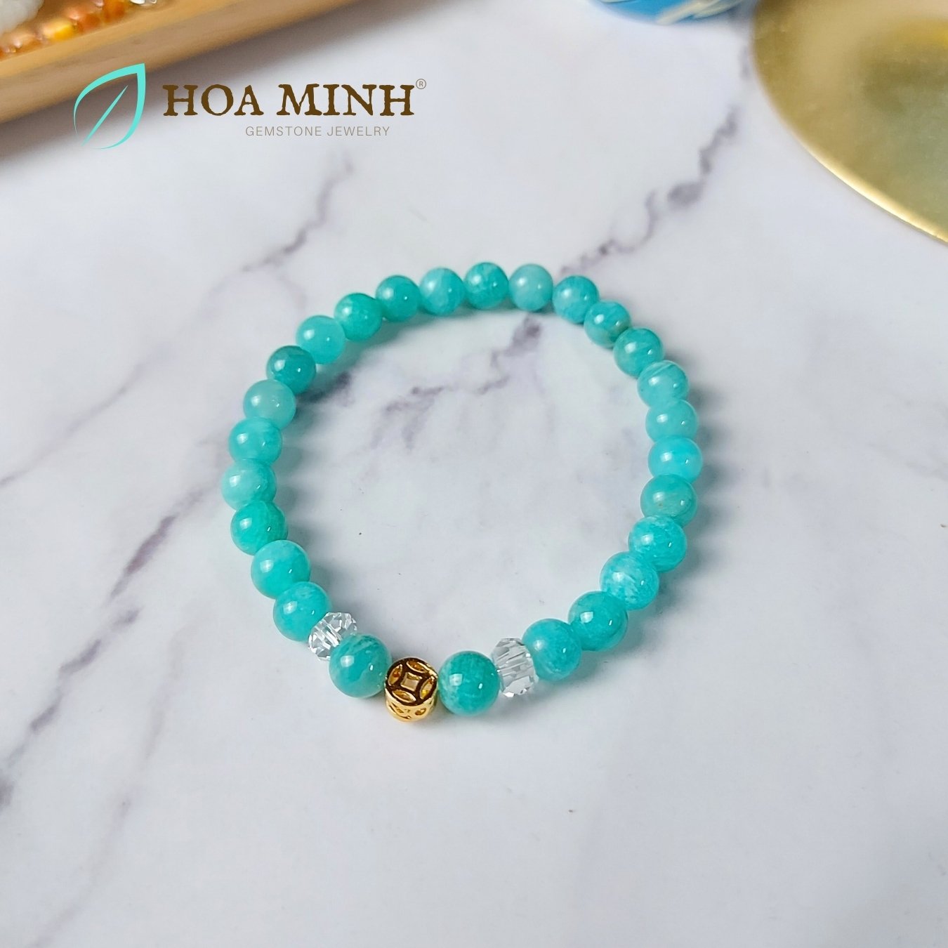 10-vong-tay-da-amazonite-thien-thanh-size-hat-6-8-li-phoi-charm-kim-tien-banh-xe-thach-anh-trang-cat-giac-hop-menh-thuy-moc-hoa-minh-gem.jpg
