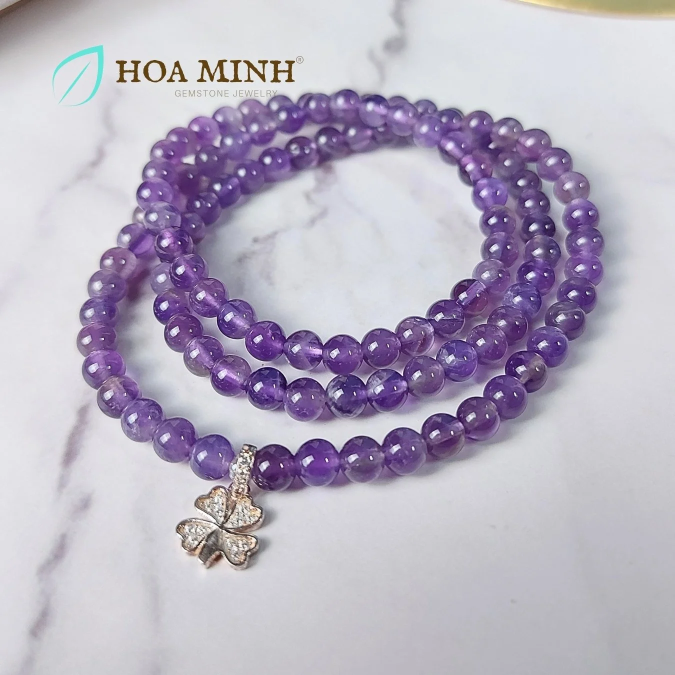 1-vong-tay-chuoi-108-hat-thach-anh-tim-amethyst-size-hat-5-5-li-phoi-charm-bac-co-4-la-dinh-da-nho-hoa-minh-gem.jpg
