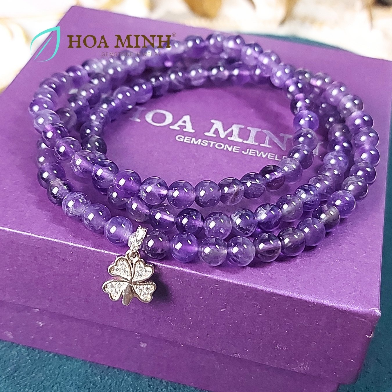 7-vong-tay-chuoi-108-hat-thach-anh-tim-amethyst-size-hat-5-5-li-phoi-charm-bac-co-4-la-dinh-da-nho-hoa-minh-gem.jpg