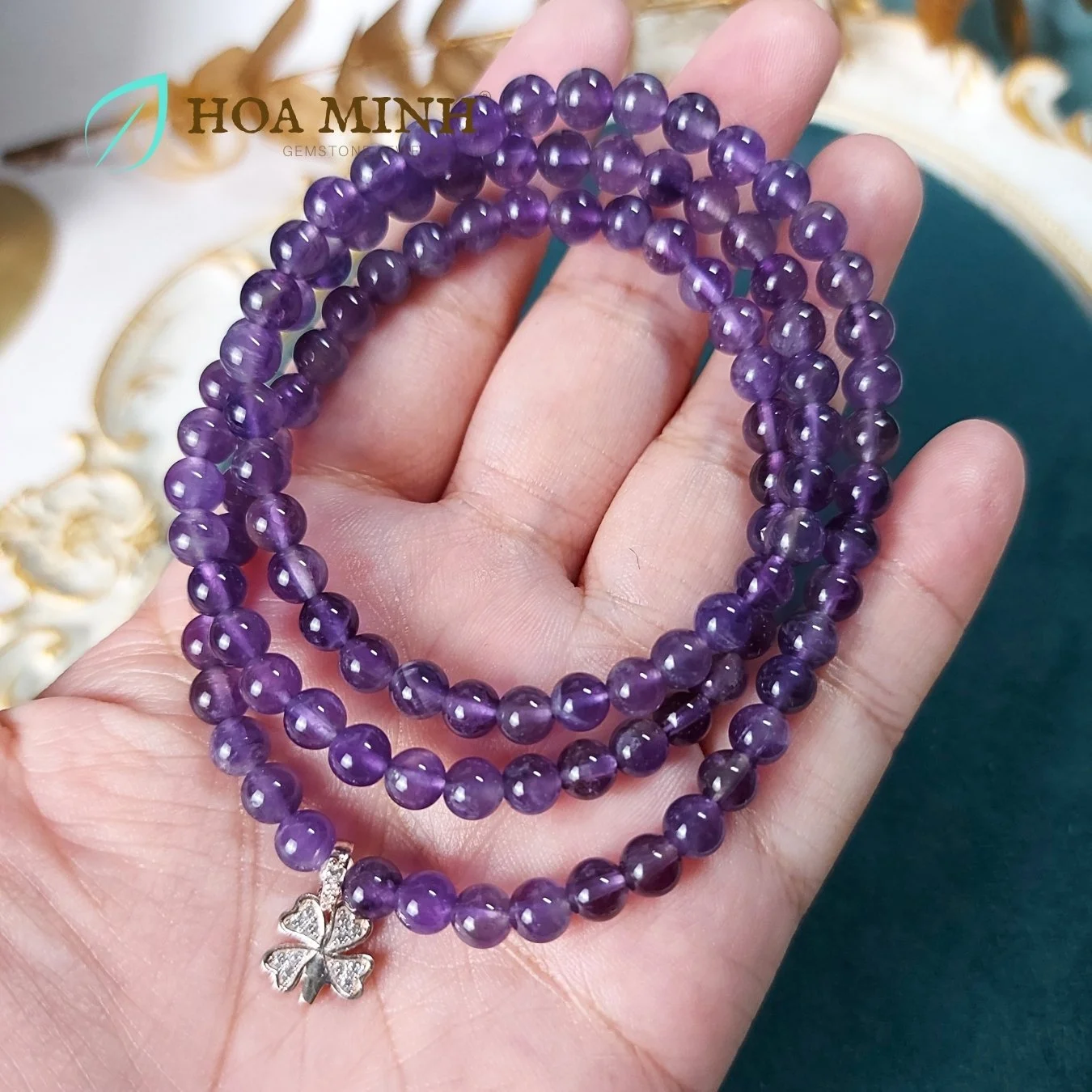 9-vong-tay-chuoi-108-hat-thach-anh-tim-amethyst-size-hat-5-5-li-phoi-charm-bac-co-4-la-dinh-da-nho-hoa-minh-gem.jpg