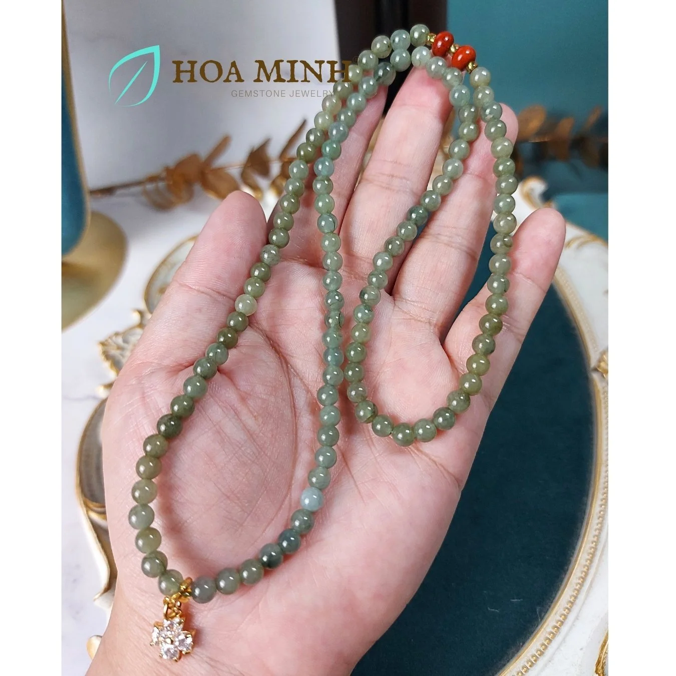 6-vong-tay-108-hat-da-cam-thach-dau-size-hat-5-3-li-phoi-charm-hoa-4-canh-dinh-da-sang-trong-hoa-minh-gem.jpg