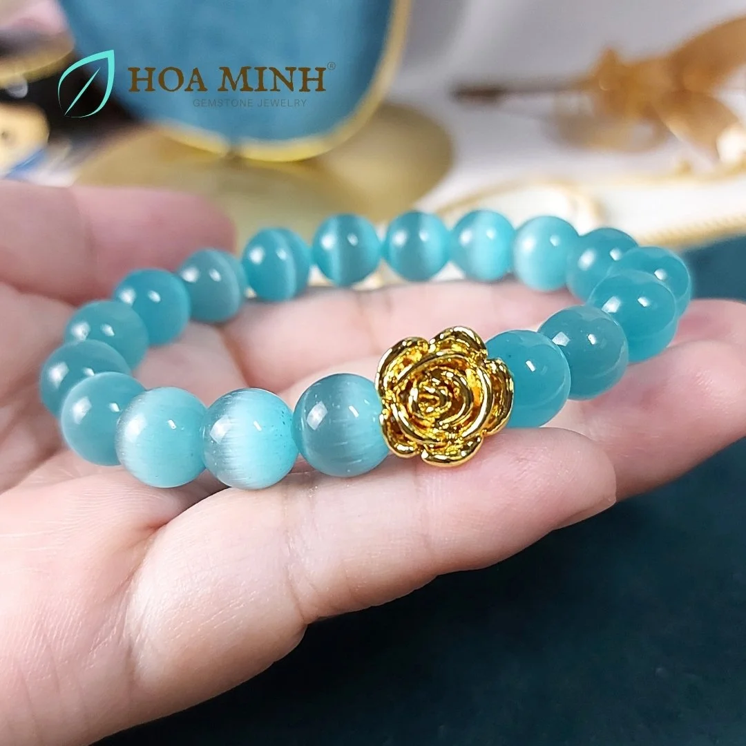 Vòng tay phong thủy đá Mắt Mèo màu xanh biển size hạt 10 li phối charm hoa xi mạ cao cấp