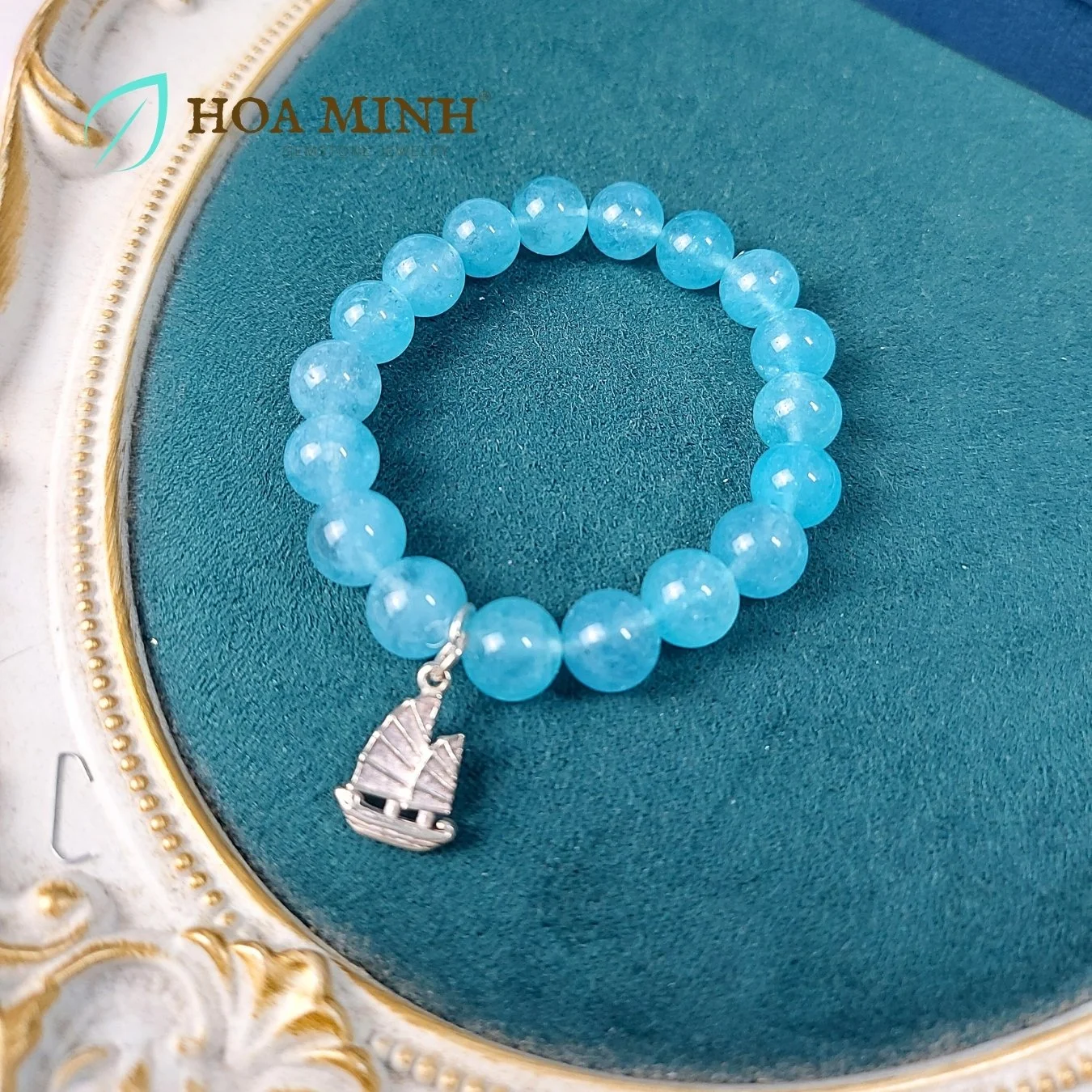2-vong-tay-da-aquamarine-ngoc-hai-lam-size-hat-10-li-tu-nhien-phoi-charm-bac-treo-kieu-con-thuyen-thuan-buom-xuoi-gio-hoa-minh-gem.jpg