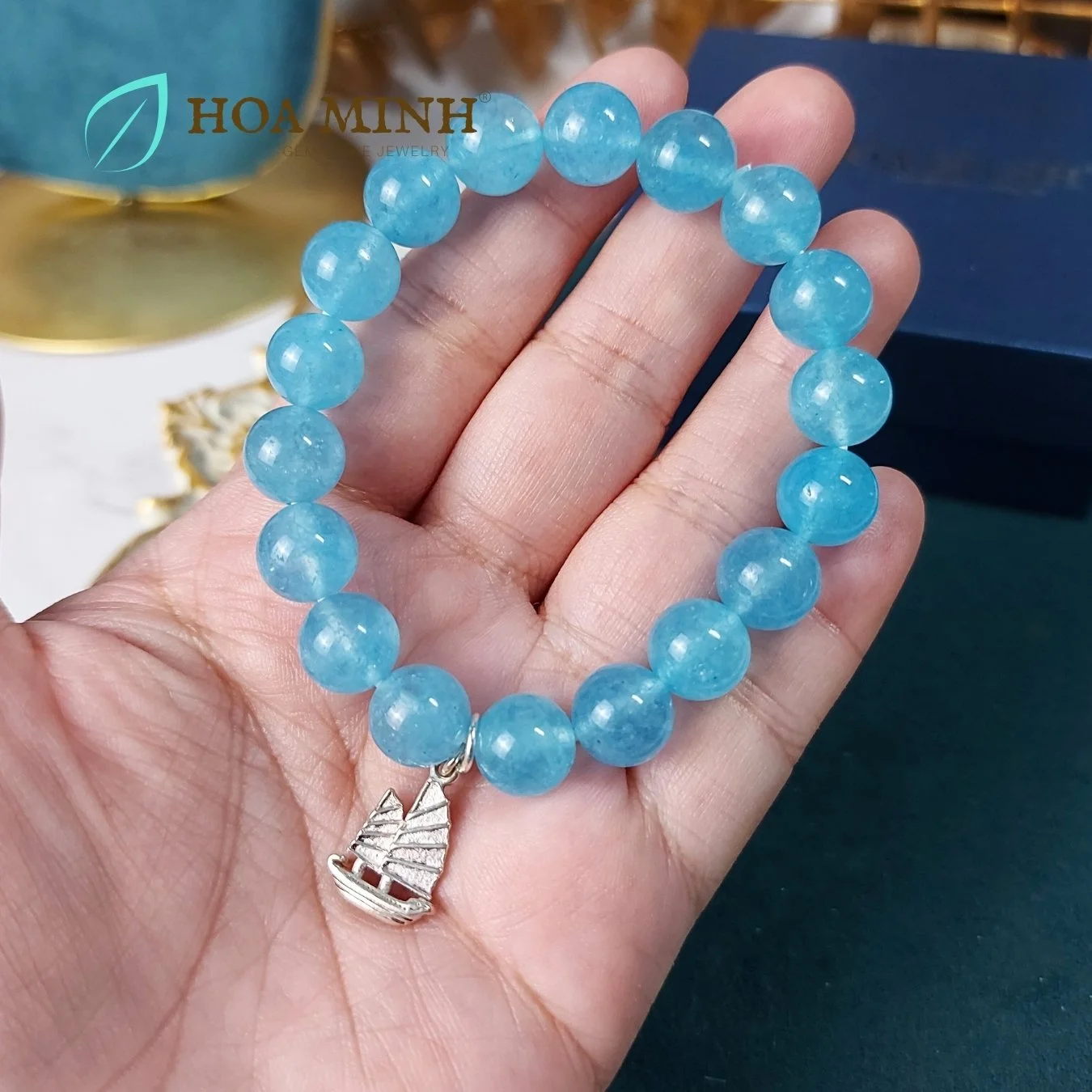3-vong-tay-da-aquamarine-ngoc-hai-lam-size-hat-10-li-tu-nhien-phoi-charm-bac-treo-kieu-con-thuyen-thuan-buom-xuoi-gio-hoa-minh-gem.jpg