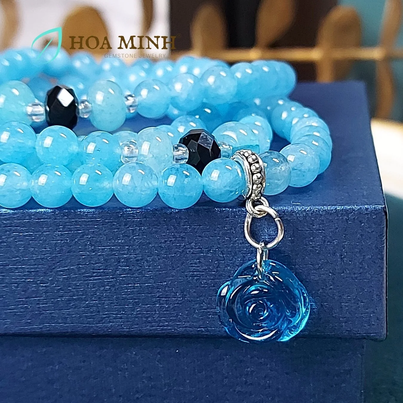 2-vong-chuoi-108-hat-da-aquamarine-size-6-5-li-phoi-vien-banh-xe-ma-nao-den-charm-hoa-hong-xanh-tinh-khoi-phong-thuy-binh-an-hoa-minh-gem.jpg