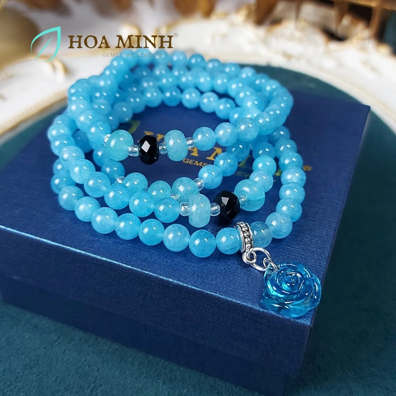 4-vong-chuoi-108-hat-da-aquamarine-size-6-5-li-phoi-vien-banh-xe-ma-nao-den-charm-hoa-hong-xanh-tinh-khoi-phong-thuy-binh-an-hoa-minh-gem.jpg