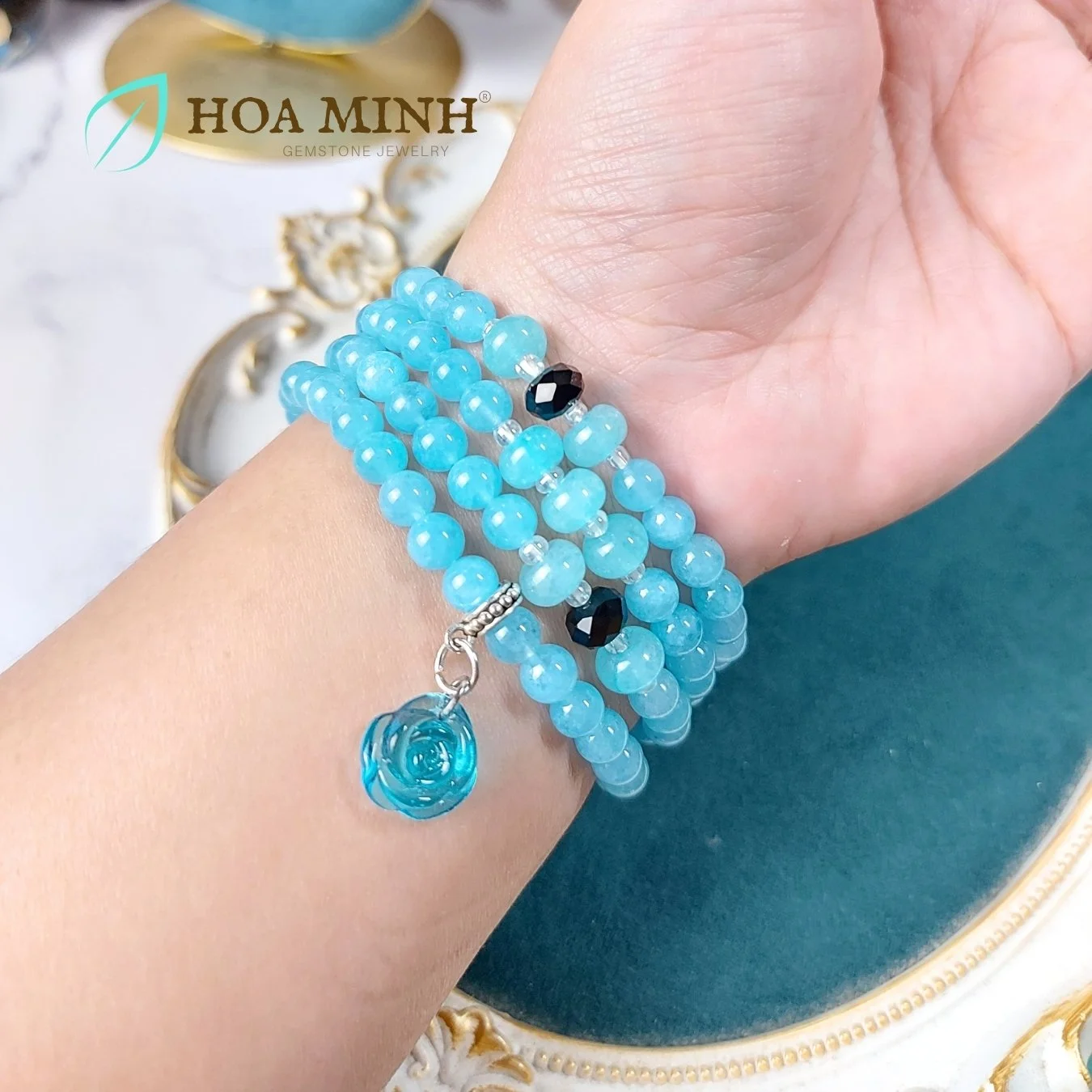5-vong-chuoi-108-hat-da-aquamarine-size-6-5-li-phoi-vien-banh-xe-ma-nao-den-charm-hoa-hong-xanh-tinh-khoi-phong-thuy-binh-an-hoa-minh-gem.jpg