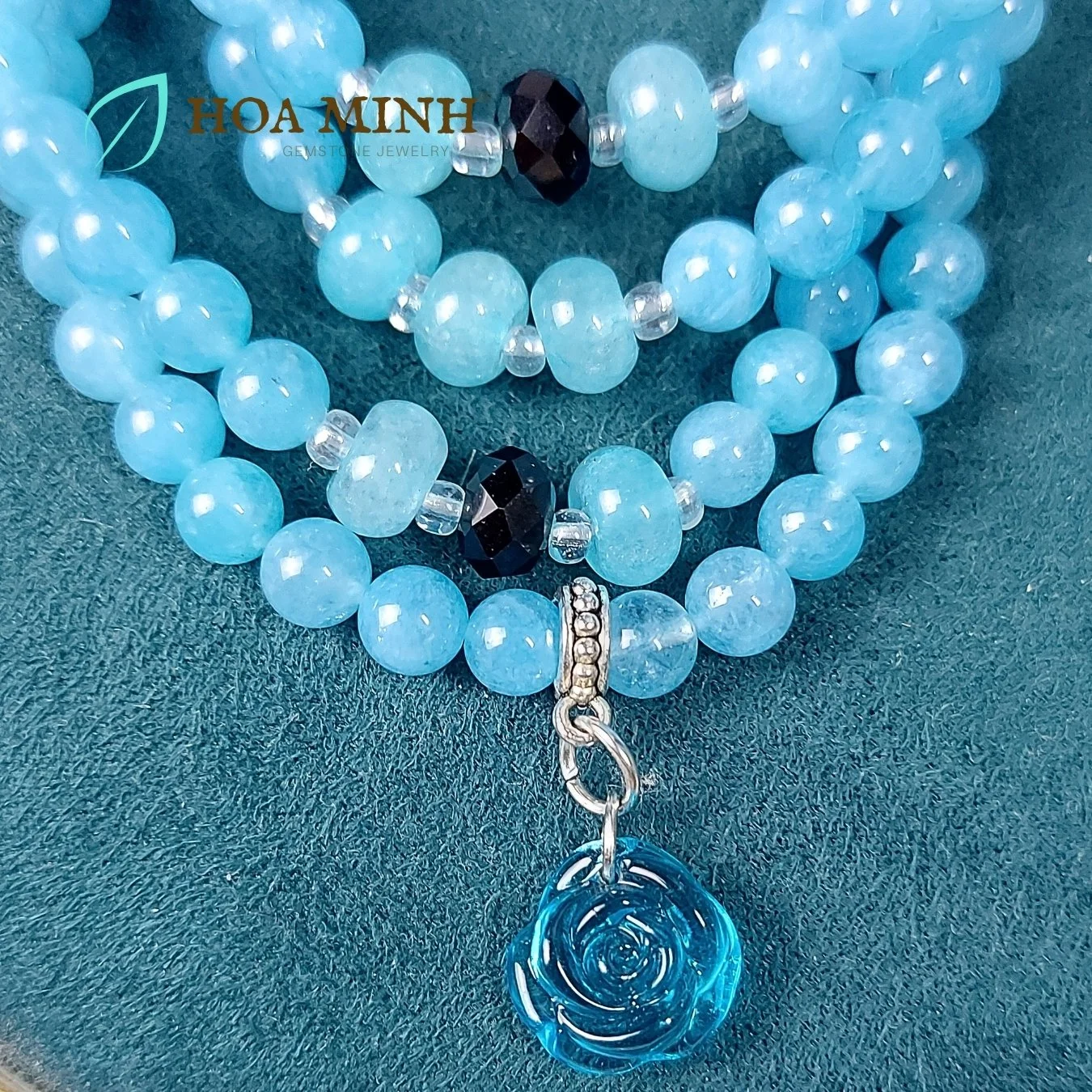9-vong-chuoi-108-hat-da-aquamarine-size-6-5-li-phoi-vien-banh-xe-ma-nao-den-charm-hoa-hong-xanh-tinh-khoi-phong-thuy-binh-an-hoa-minh-gem.jpg