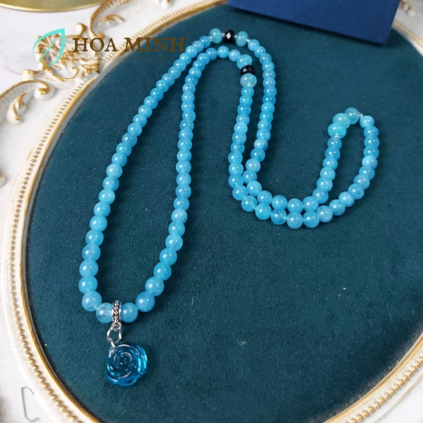 11-vong-chuoi-108-hat-da-aquamarine-size-6-5-li-phoi-vien-banh-xe-ma-nao-den-charm-hoa-hong-xanh-tinh-khoi-phong-thuy-binh-an-hoa-minh-gem.jpg