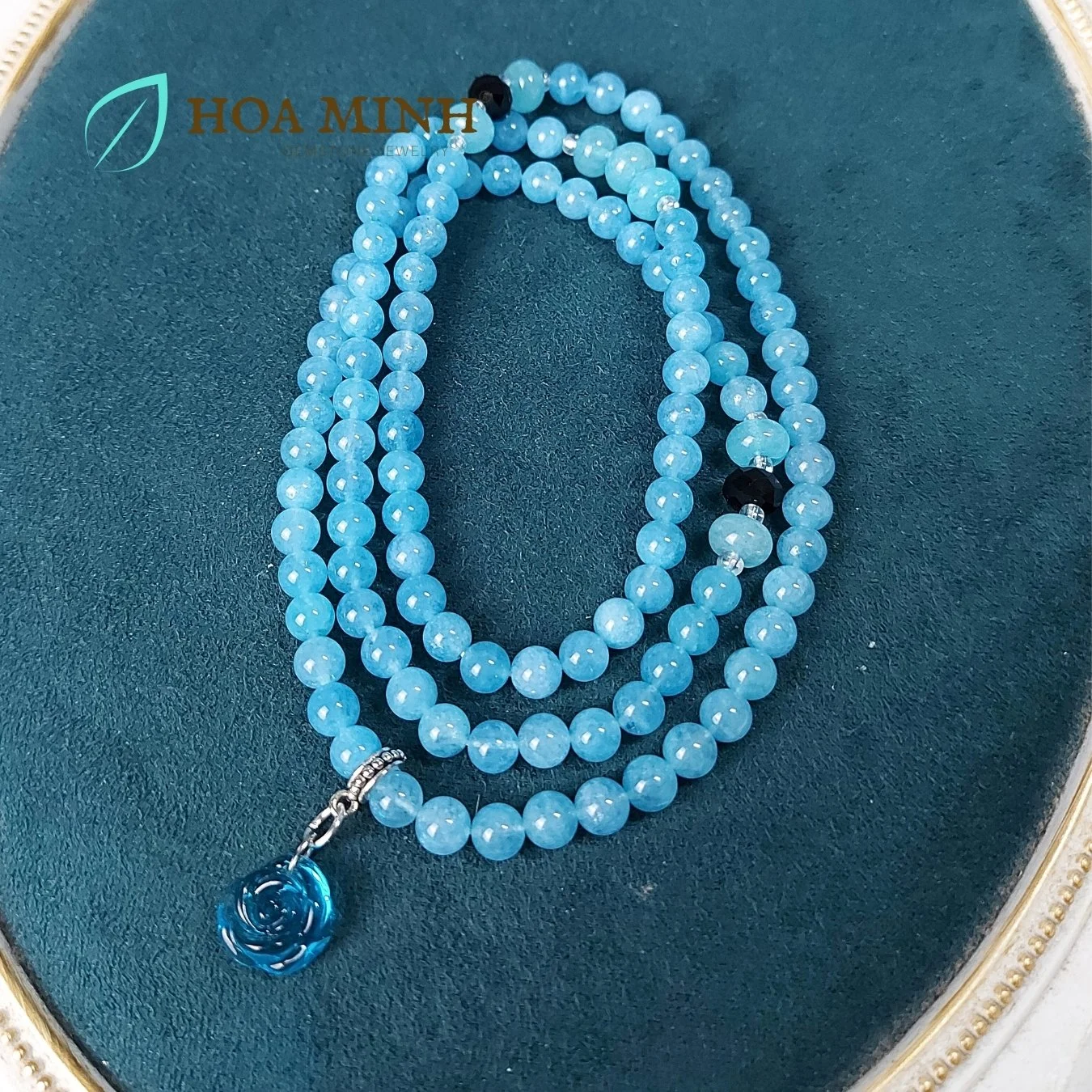 12-vong-chuoi-108-hat-da-aquamarine-size-6-5-li-phoi-vien-banh-xe-ma-nao-den-charm-hoa-hong-xanh-tinh-khoi-phong-thuy-binh-an-hoa-minh-gem.jpg