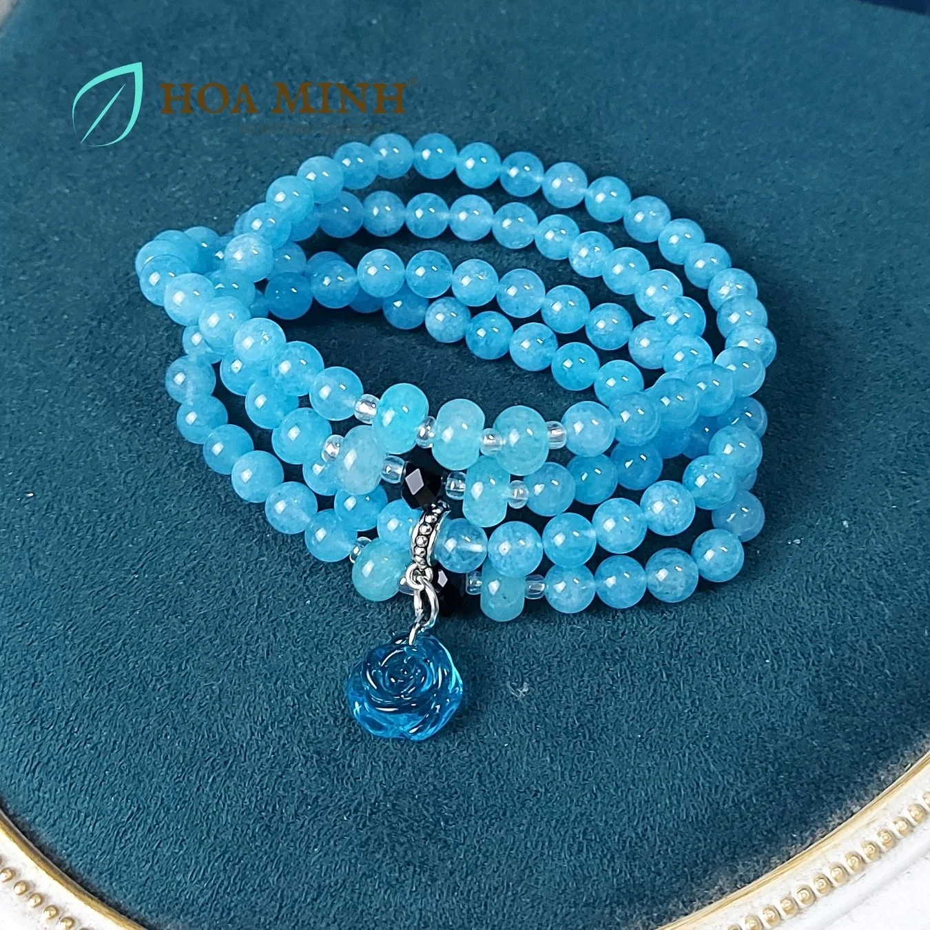 13-vong-chuoi-108-hat-da-aquamarine-size-6-5-li-phoi-vien-banh-xe-ma-nao-den-charm-hoa-hong-xanh-tinh-khoi-phong-thuy-binh-an-hoa-minh-gem.jpg