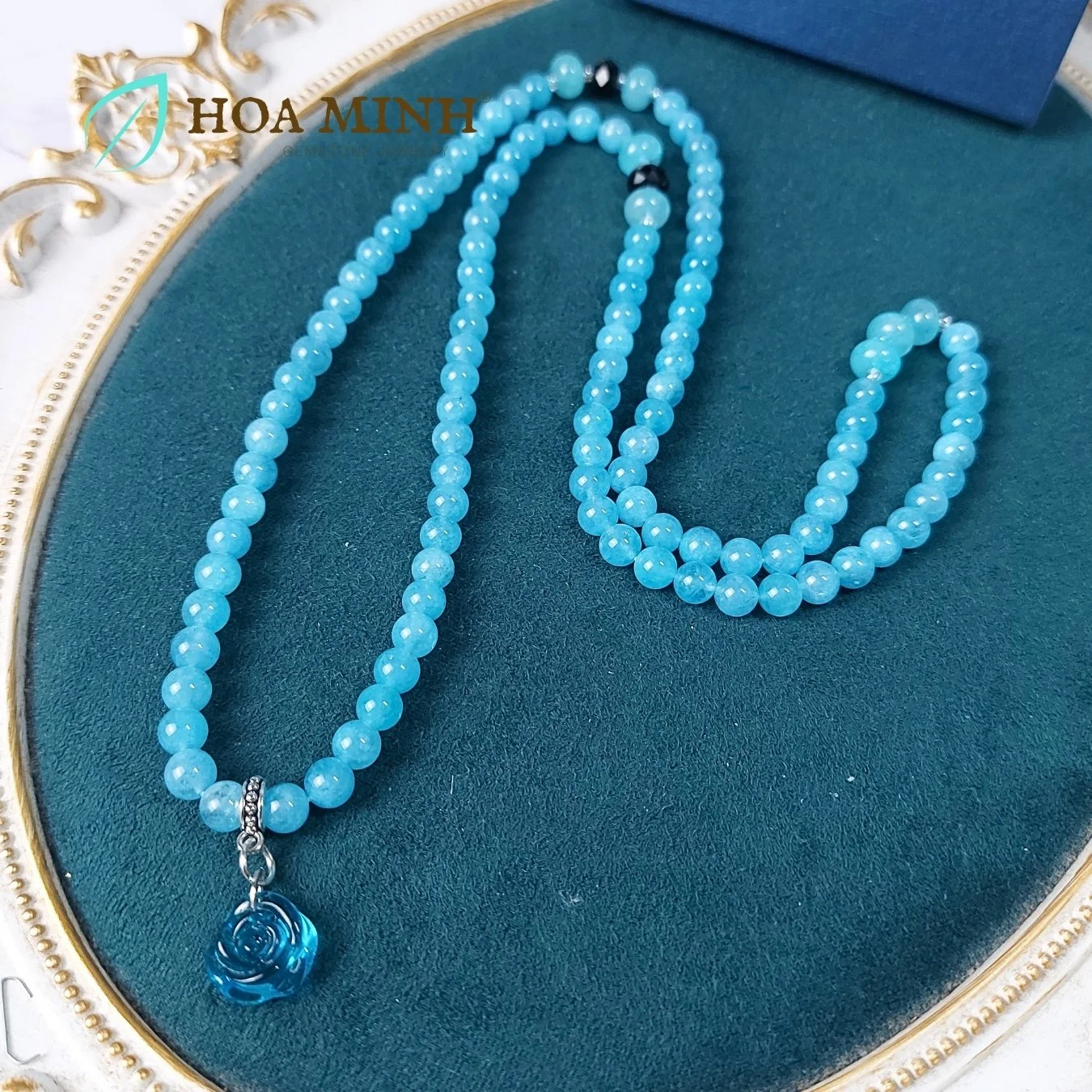 14-vong-chuoi-108-hat-da-aquamarine-size-6-5-li-phoi-vien-banh-xe-ma-nao-den-charm-hoa-hong-xanh-tinh-khoi-phong-thuy-binh-an-hoa-minh-gem.jpg