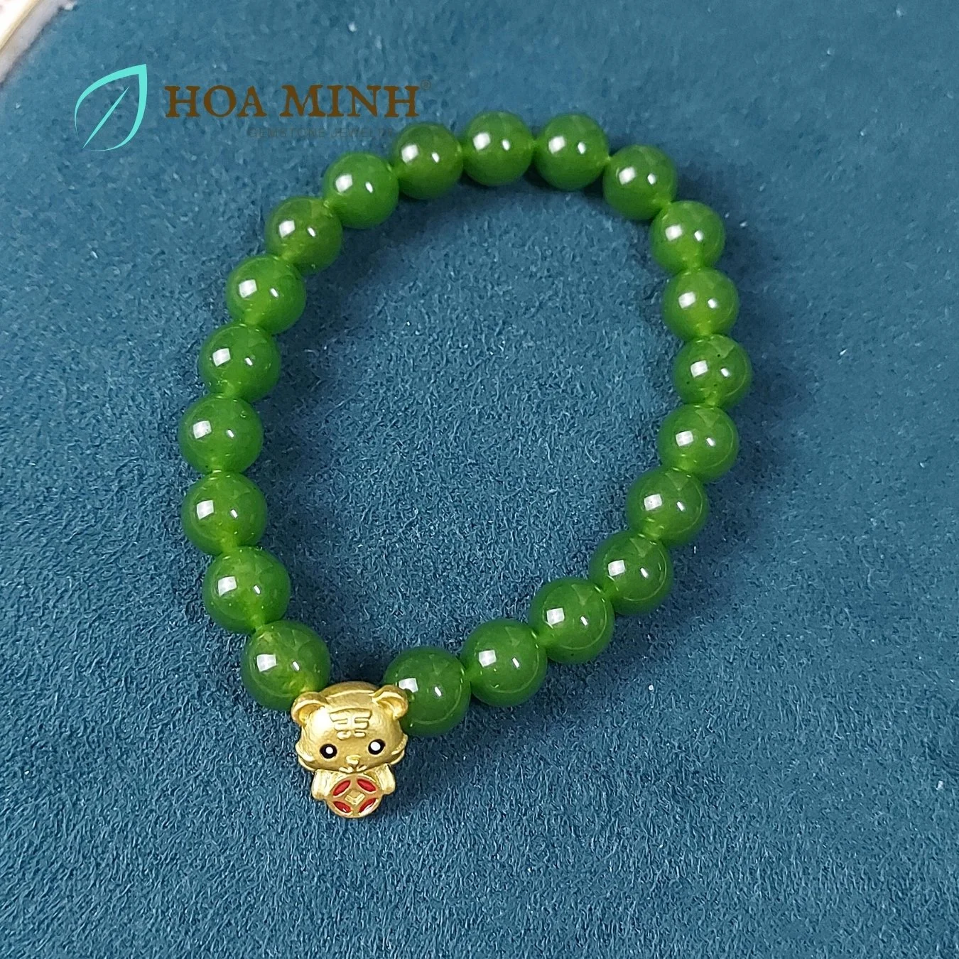 27-vong-tay-phong-thuy-da-ma-nao-mau-xanh-ngoc-size-hat-8-li-phoi-charm-xi-vang-phong-cach-sang-trong-thoi-trang-hoa-minh-gem.jpg