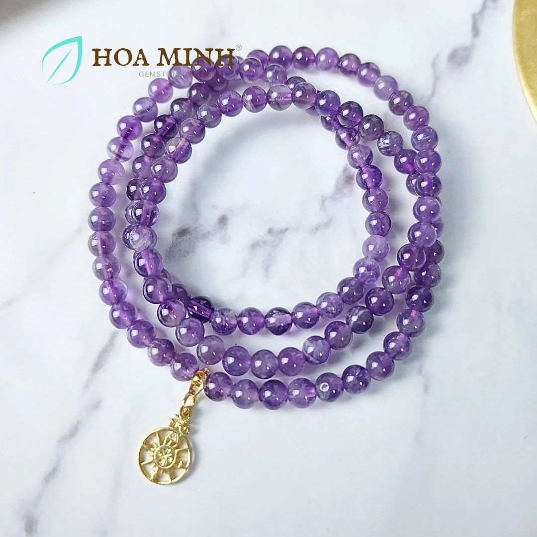 1-vong-chuoi-108-hat-da-thach-anh-tim-amethyst-tu-nhien-size-hat-5-5-li-phoi-charm-bac-xi-vang-hinh-la-ban-cao-cap-hoa-minh-gem.jpg