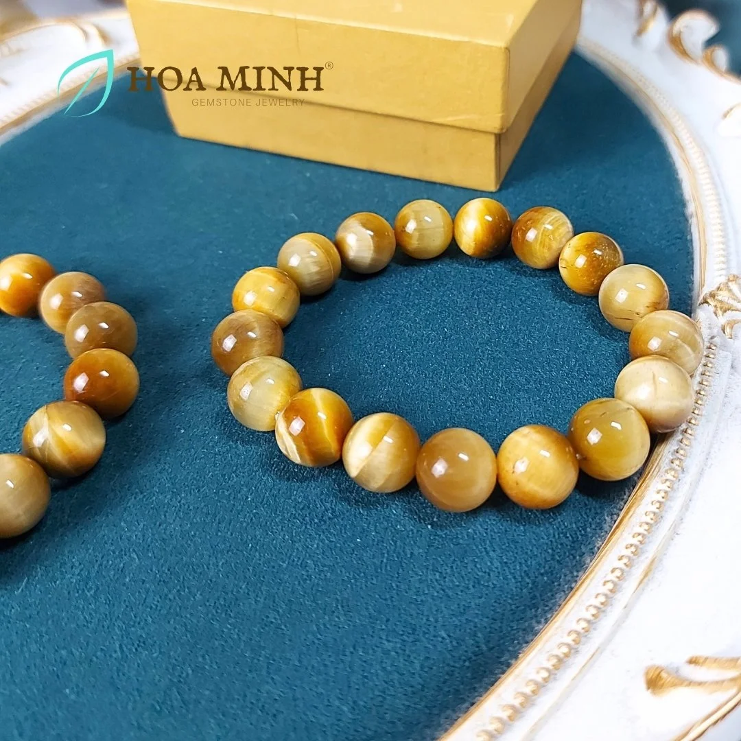 2-vong-tay-phong-thuy-da-mat-ho-vang-tam-vip-size-hat-12-li-khong-ken-menh-hoa-minh-gem.jpg