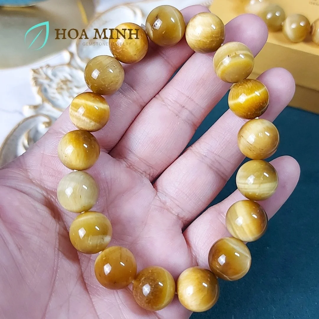7-vong-tay-phong-thuy-da-mat-ho-vang-tam-vip-size-hat-12-li-khong-ken-menh-hoa-minh-gem.jpg