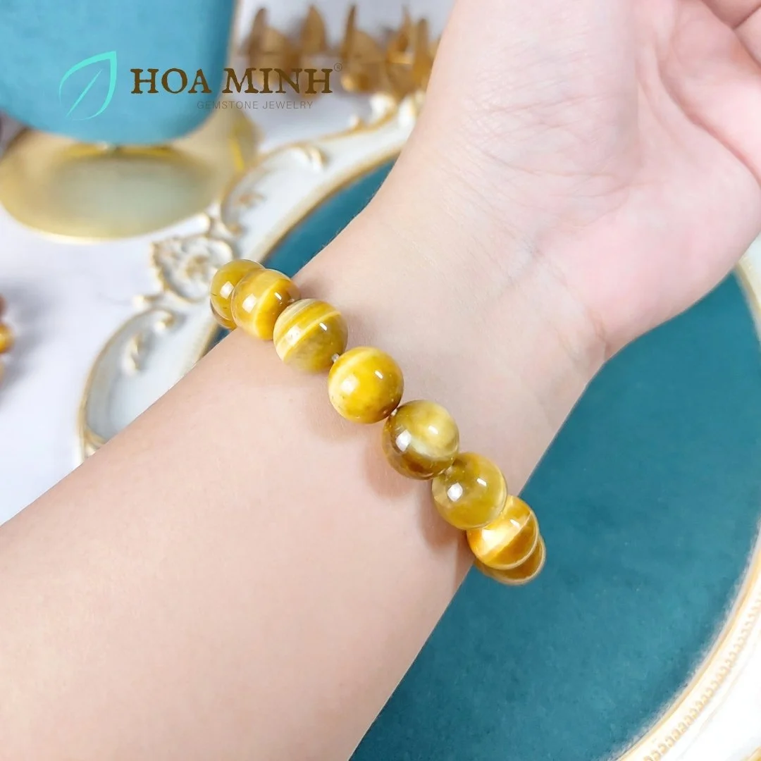 8-vong-tay-phong-thuy-da-mat-ho-vang-tam-vip-size-hat-12-li-khong-ken-menh-hoa-minh-gem.jpg