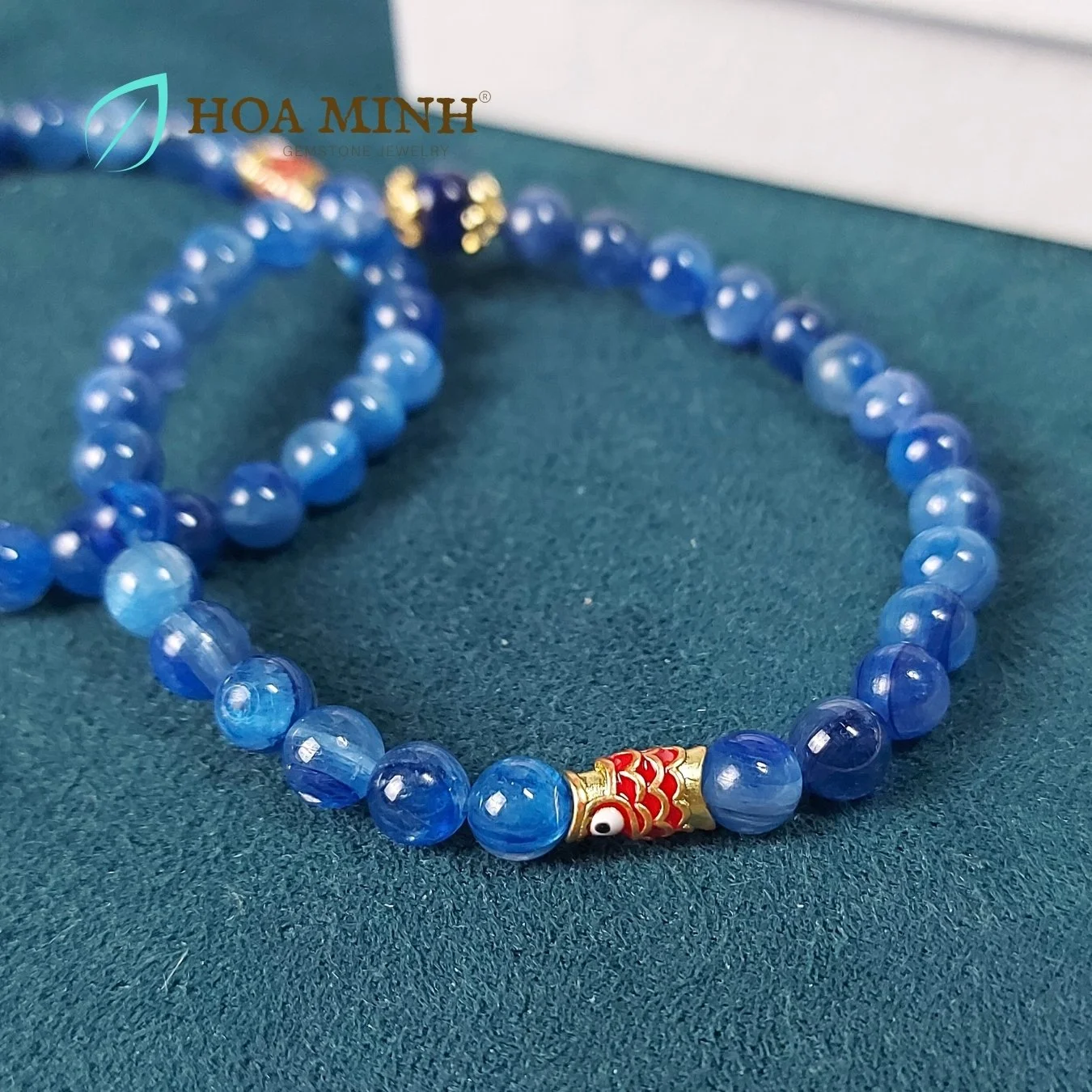 5-vong-tay-da-kyanite-vip-sapphia-nuoc-tu-nhien-size-mini-5-8-li-phoi-charm-op-hoa-charm-ca-chep-xo-ngang-xinh-xan-hoa-minh-gem.jpg